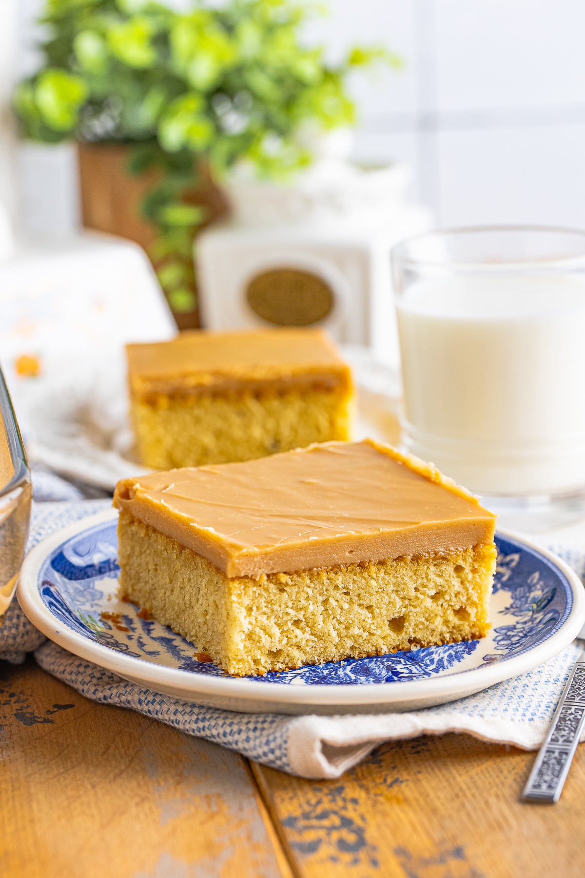two slices of Caramel Cake on plates
