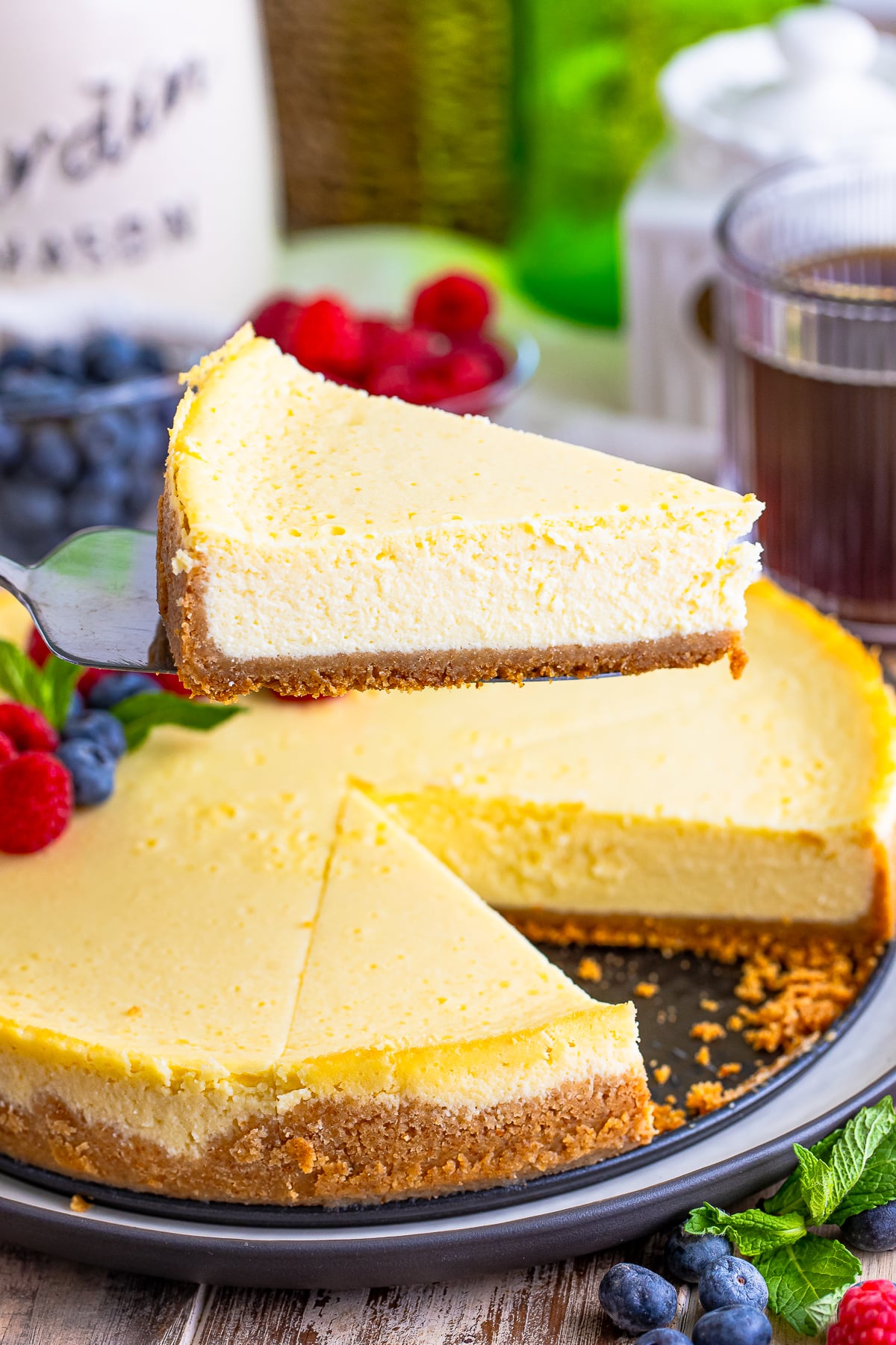 a slice of Cottage Cheese Cake on a cake server in air