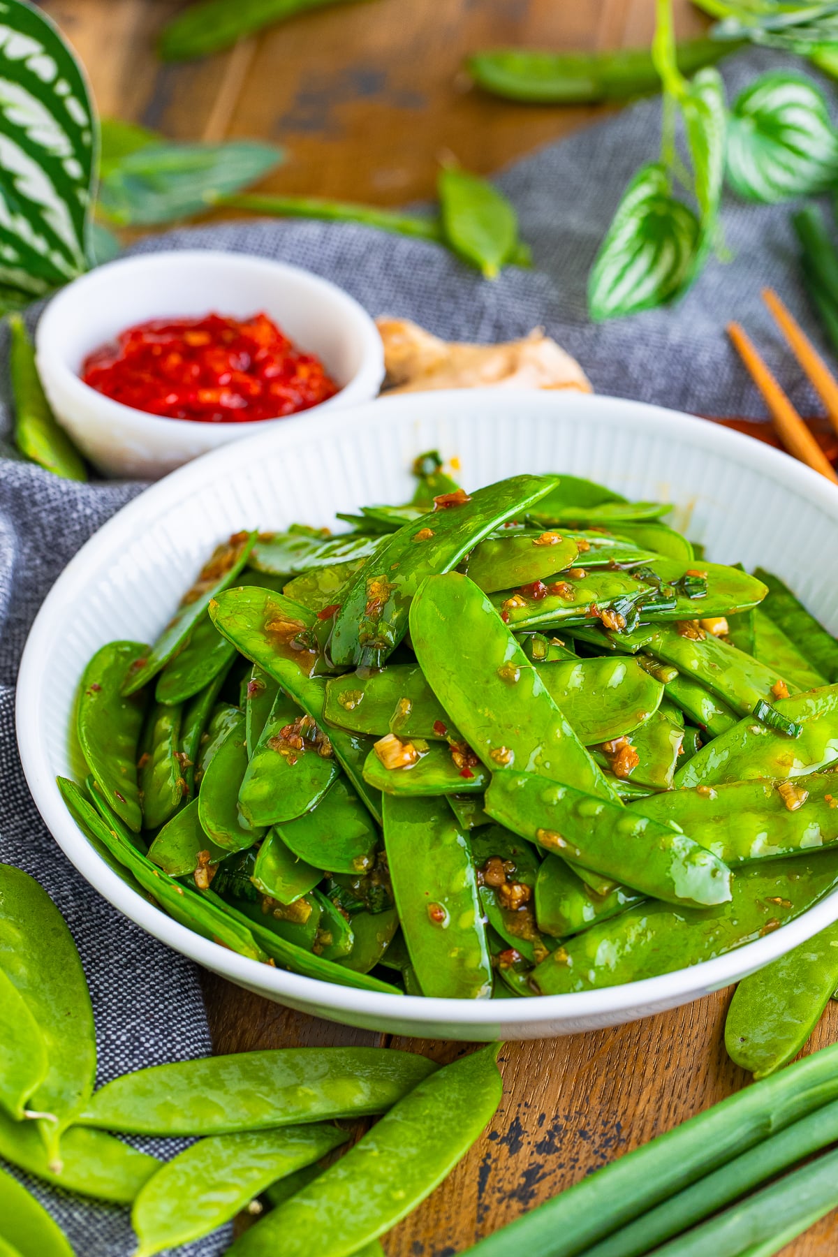 snow peas recipe served in a white bowl