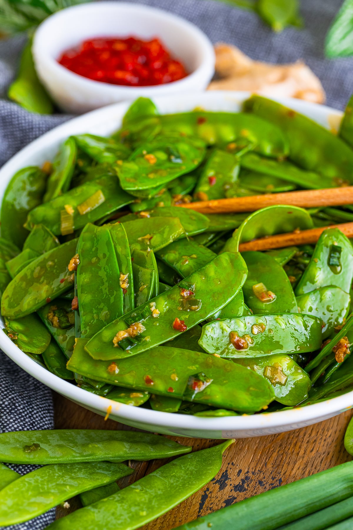 chopsticks in a bowl of snow peas recipe