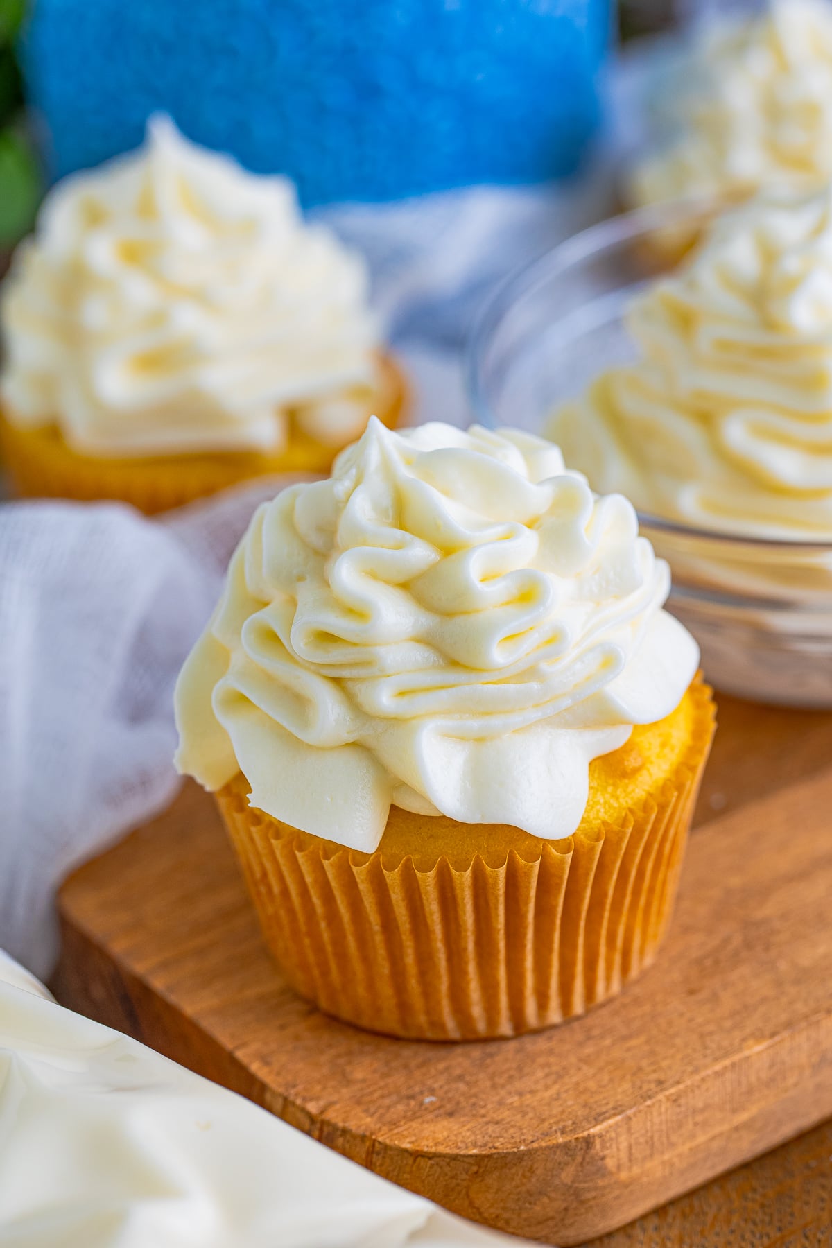 up close image of a cupcake topped with Cream Cheese Frosting