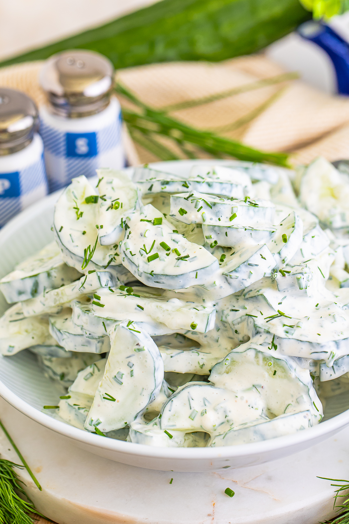up close image of Cucumber Salad with Sour Cream in a bowl