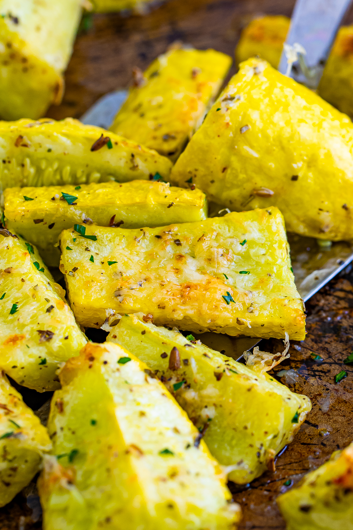 up close image of Roasted Yellow Squash on sheet tray