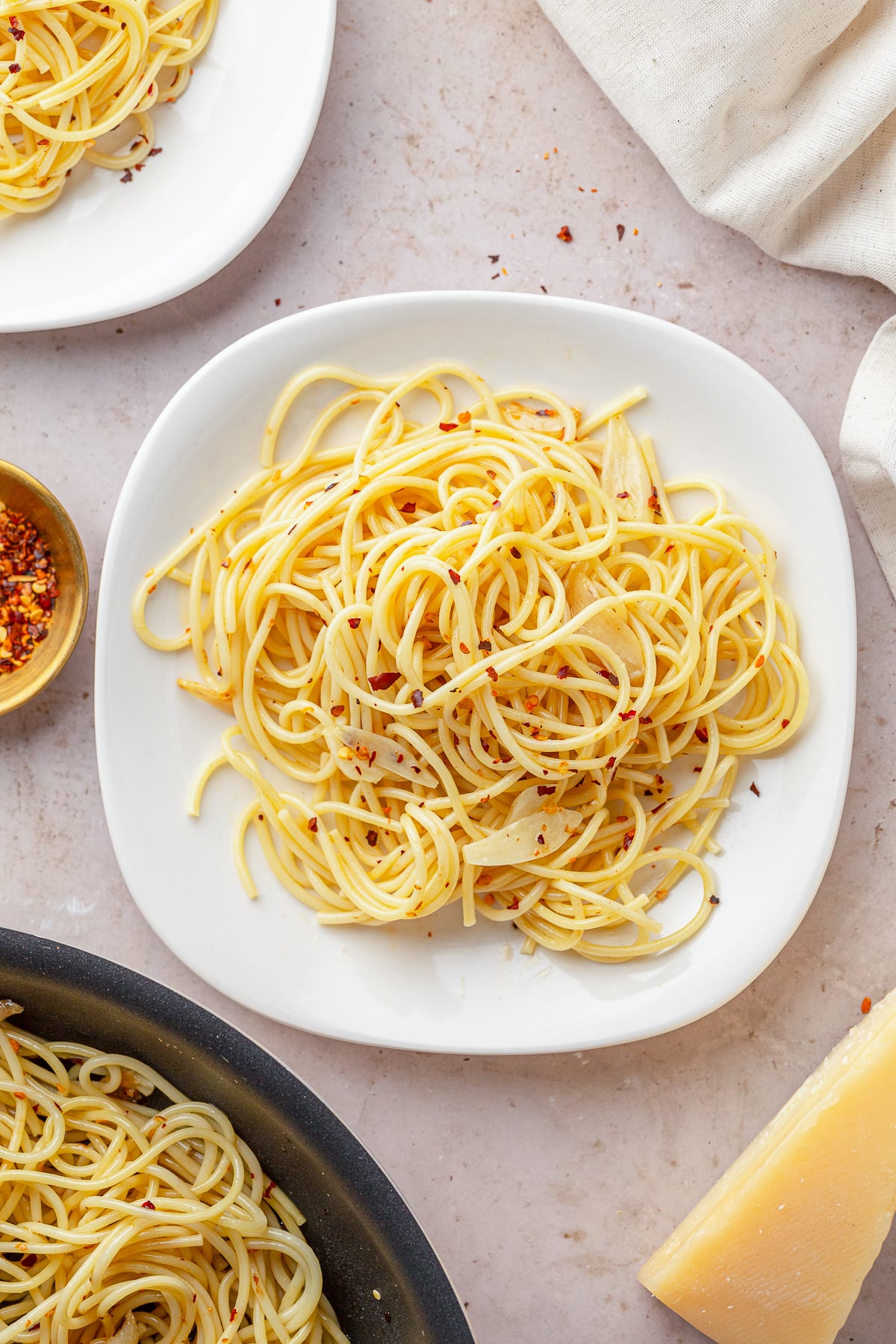 Some nights you want the big Sunday sauce that simmers all afternoon. Other nights, it’s 6 p.m., everyone is hungry, and the fridge looks empty. Enter Aglio e Olio.