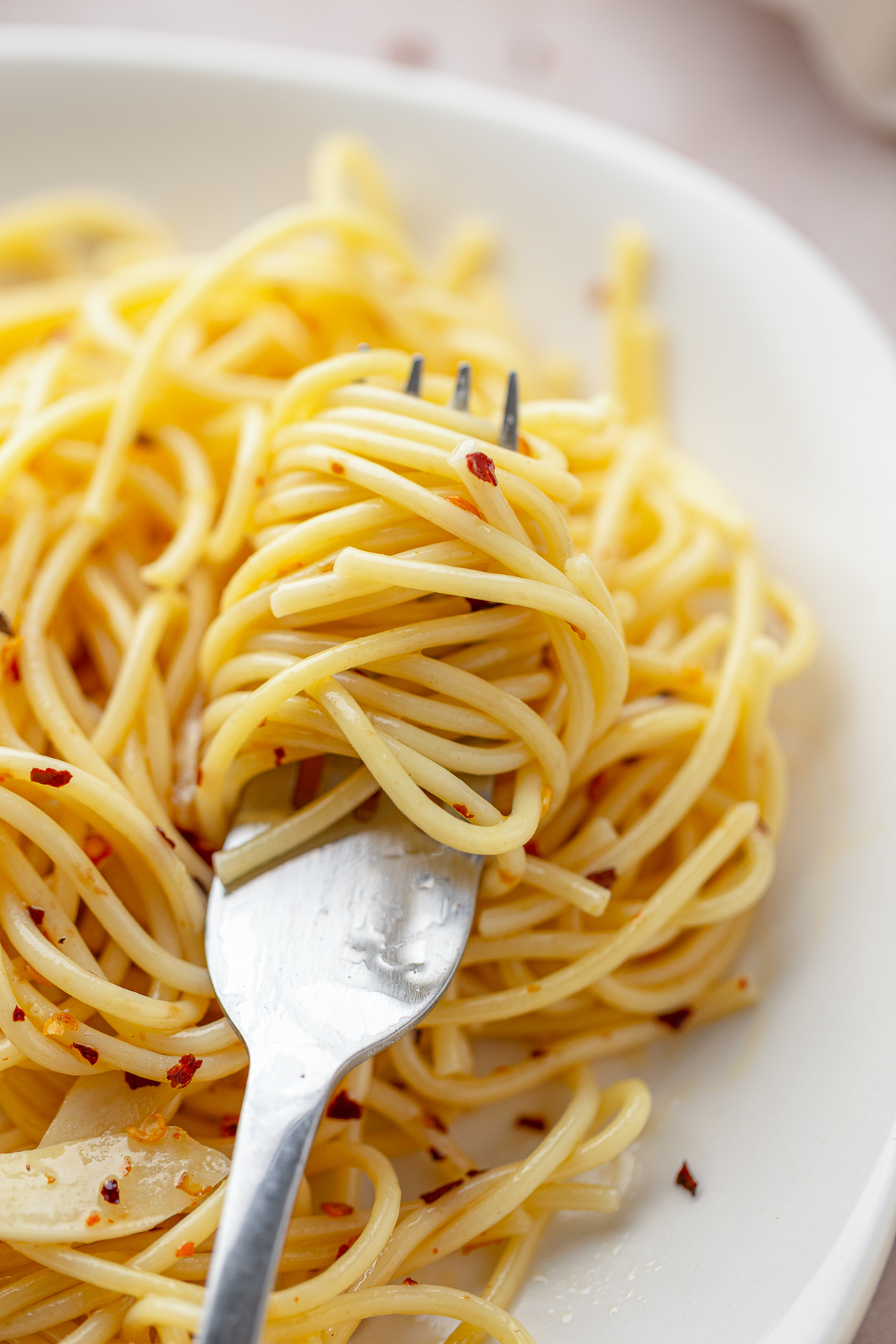 Some nights you want the big Sunday sauce that simmers all afternoon. Other nights, it’s 6 p.m., everyone is hungry, and the fridge looks empty. Enter Aglio e Olio.