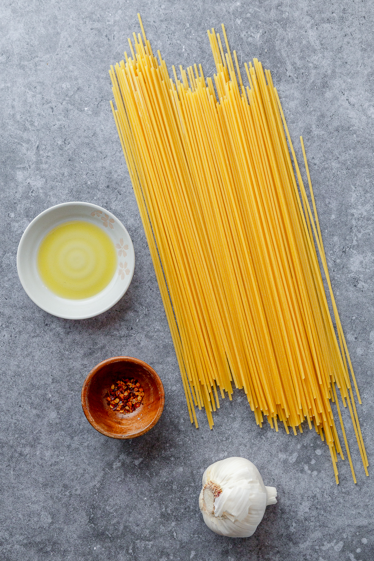 Some nights you want the big Sunday sauce that simmers all afternoon. Other nights, it’s 6 p.m., everyone is hungry, and the fridge looks empty. Enter Aglio e Olio.