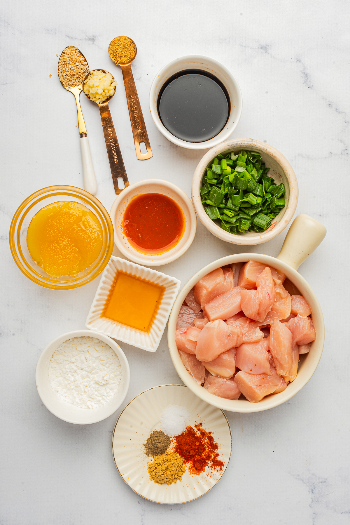 This is a picture of all the ingreadients
cornstarch

salt

cayenne pepper

black pepper

chicken breasts

vegetable oil

honey

reduced-sodium soy sauce

chili sauce

garlic

ginger

sesame oil

toasted sesame seeds

green onions