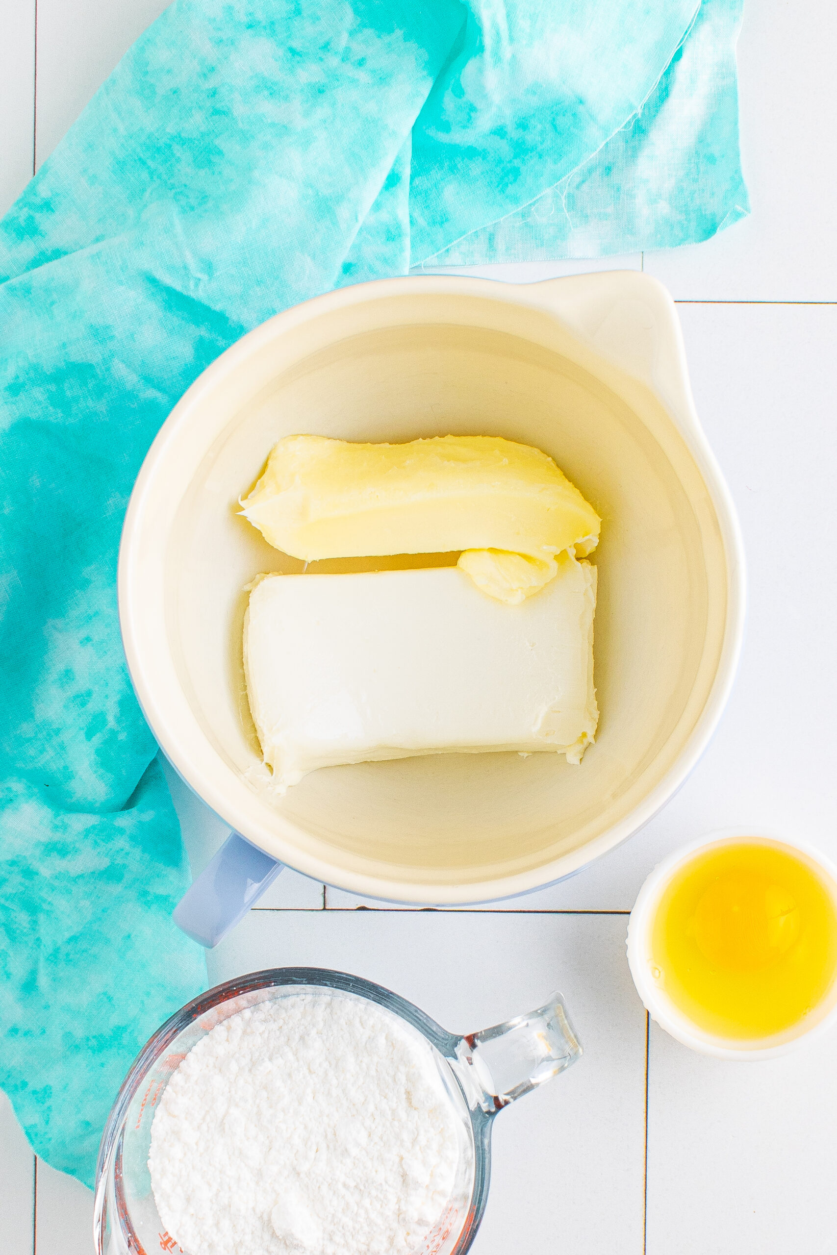 Here is a picture of all the ingredients.
cream cheese

unsalted butter

powdered sugar

egg

baking powder

vanilla extract

kosher salt

all-purpose flour