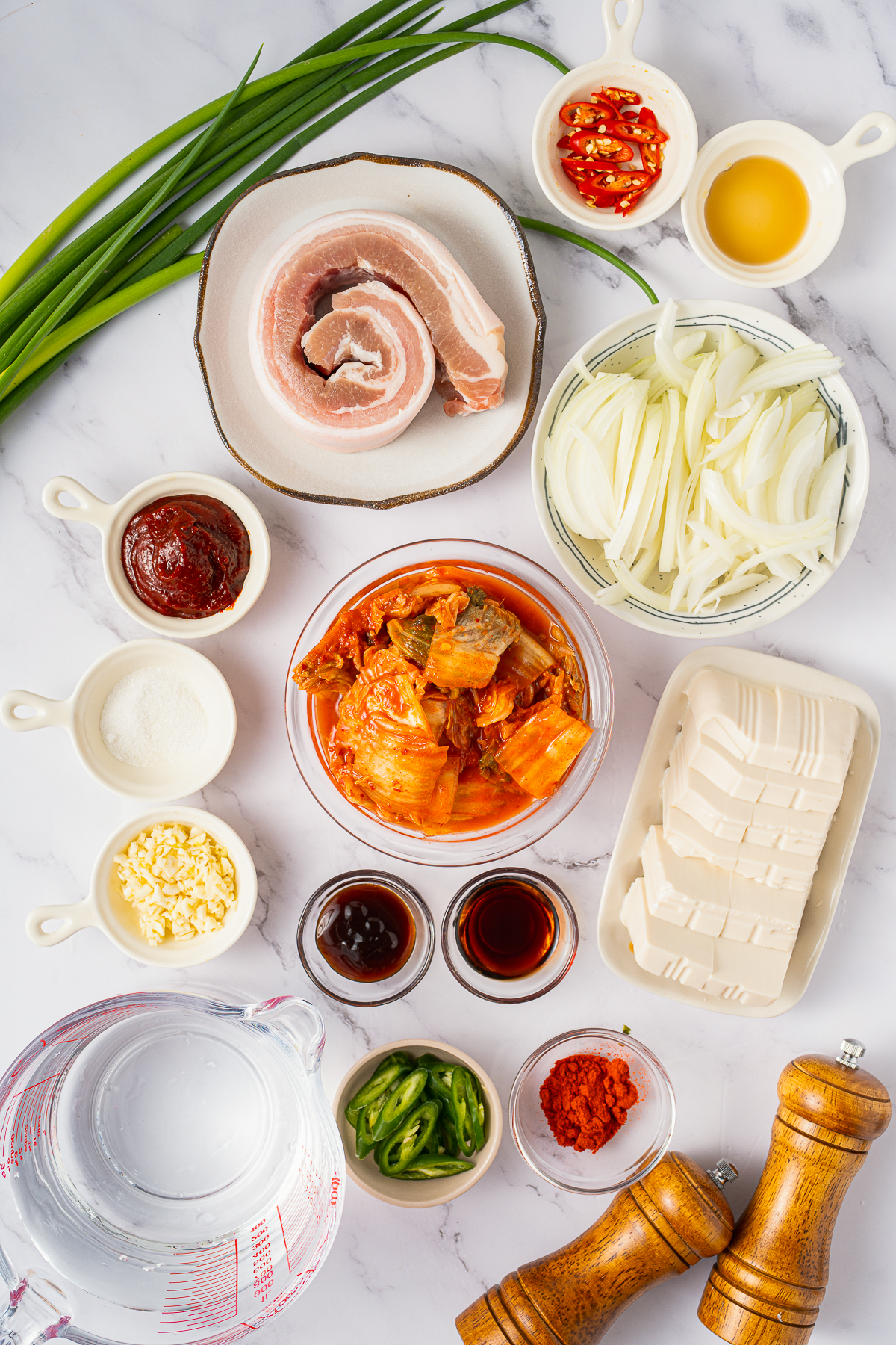 I’m not Korean (my accent is straight-up southern drawl) but I’ve fallen head-over-heels for Korean cuisine.
One spoonful of bubbling Kimchi Stew at a local Korean market and I was sold faster than you can say “bless your heart.”