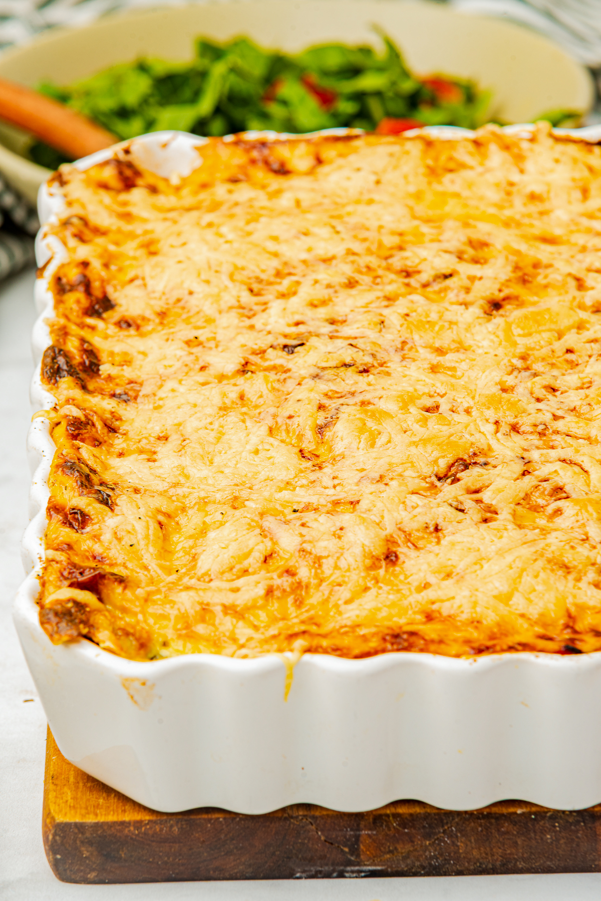 Close your eyes and picture a cozy kitchen on a hillside in Greece.

You can smell roasted eggplant slices, warm cinnamon, and a bubbly, creamy béchamel sauce turning golden under the oven light.

That, my friend, is Moussaka.