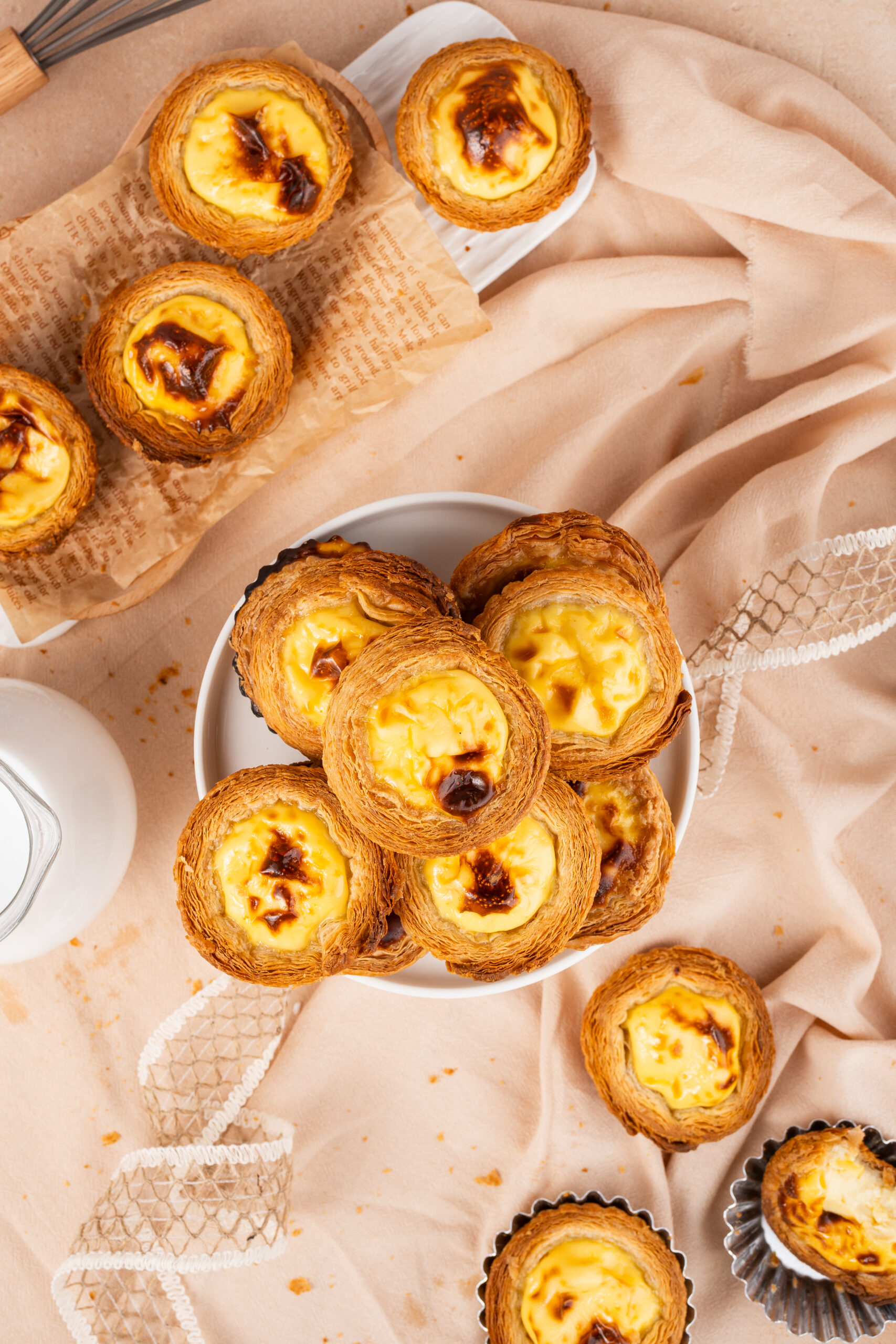 I’ve been on a “food passport” kick lately—trying dishes that don’t usually show up in my Southern pot-luck rotation.
Let me tell you, Portuguese Custard Tarts are something special.