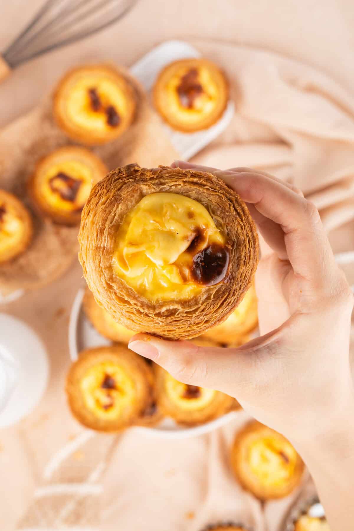I’ve been on a “food passport” kick lately—trying dishes that don’t usually show up in my Southern pot-luck rotation.
Let me tell you, Portuguese Custard Tarts are something special.