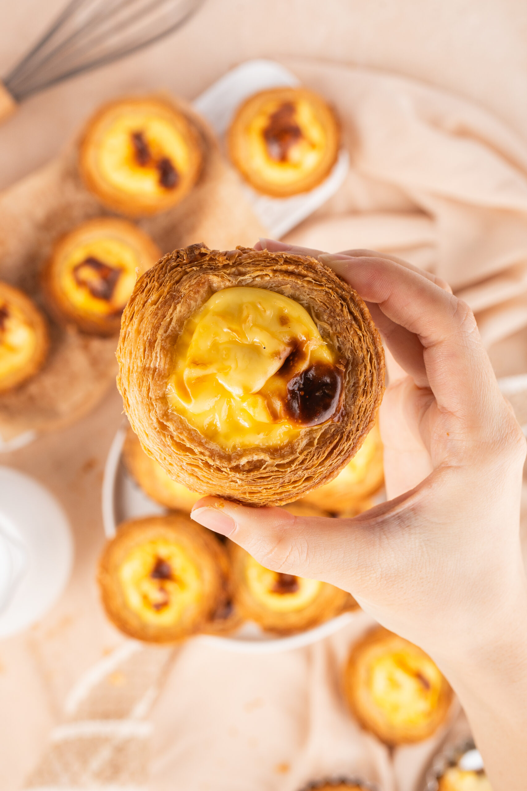 I’ve been on a “food passport” kick lately—trying dishes that don’t usually show up in my Southern pot-luck rotation.
Let me tell you, Portuguese Custard Tarts are something special.