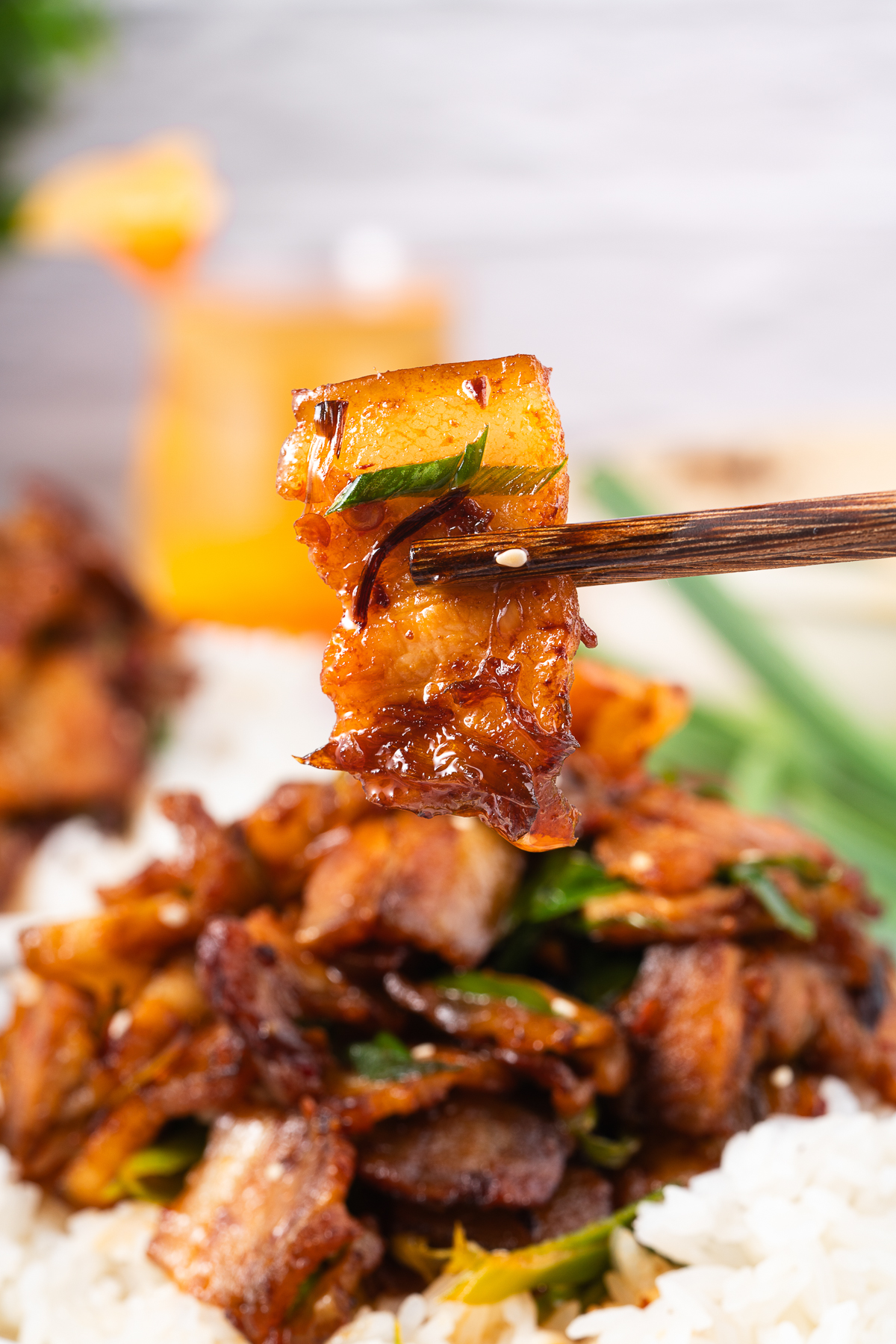 If you love bold flavors and quick dinners, Twice Cooked Pork might become your new best friend.

In China’s Sichuan Province, this dish is as famous as mapo tofu or red‑braised pork.

The Chinese name is hui guo rou, which means “returned‑to‑the‑wok pork.”

That’s because the pork belly really is Twice Cooked Pork, here: first it’s gently boiled, and then it’s hit with high heat in a sizzling stir fry!