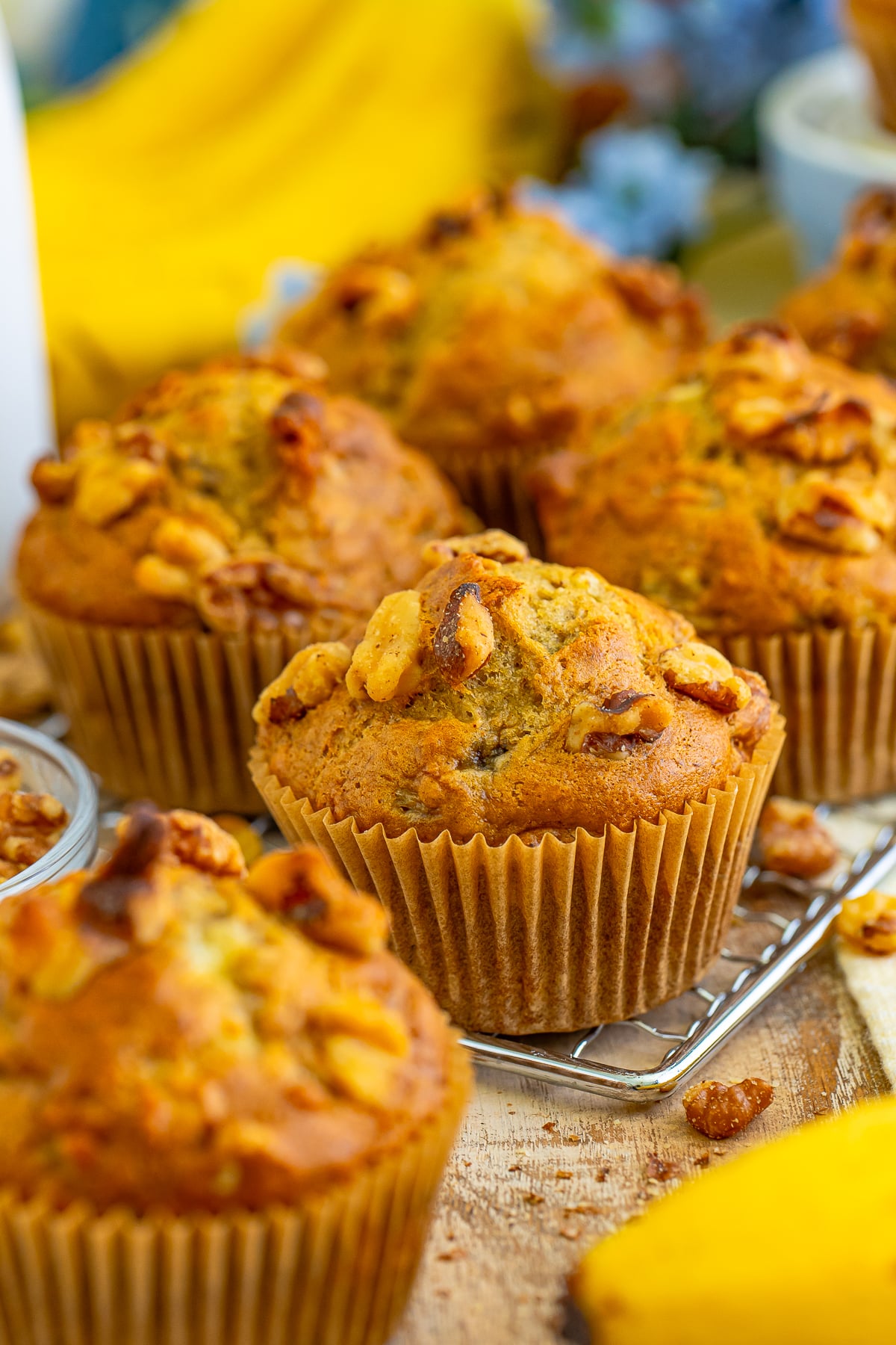 I love muffins because they’re quick bread you can eat with one hand while searching for your missing shoe. Ha!
These Banana Nut Muffins fit the bill.
