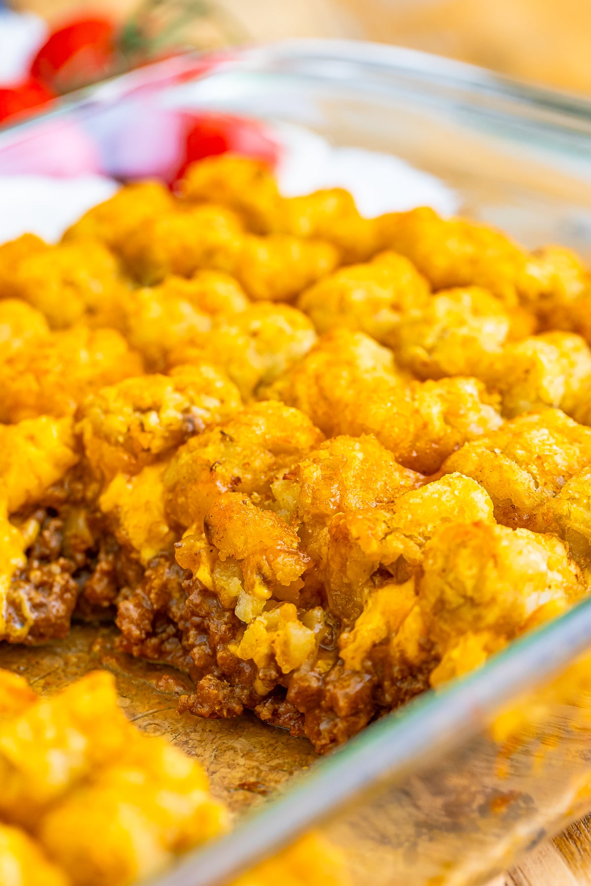 I grew up loving two things more than Saturday morning cartoons: gooey cheeseburgers and piles of crispy tater tots.
So, naturally, I eventually found the Cheeseburger Tater Tot Casserole!