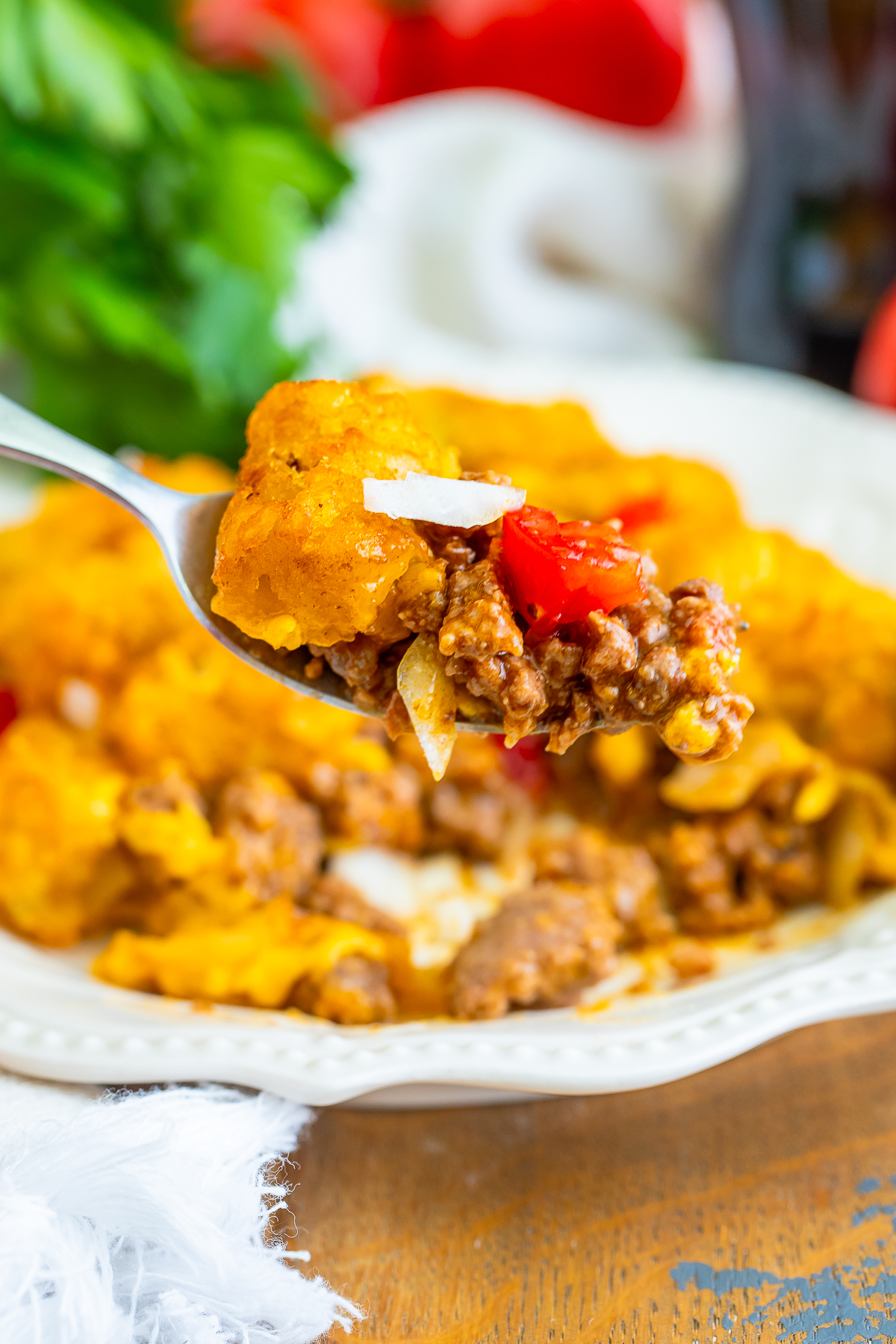 I grew up loving two things more than Saturday morning cartoons: gooey cheeseburgers and piles of crispy tater tots.
So, naturally, I eventually found the Cheeseburger Tater Tot Casserole!