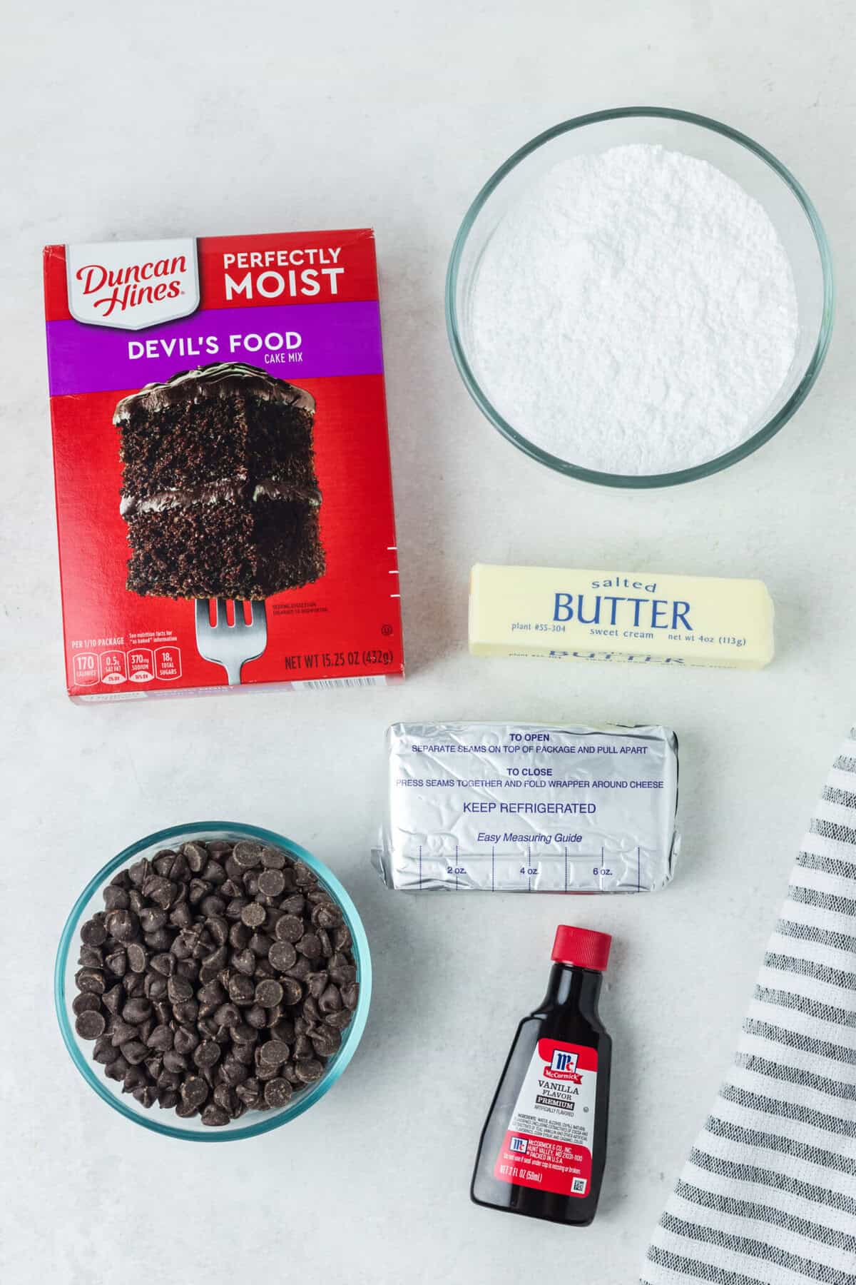 This is a pictre of all the ingredients
box devils food cake mix (plus ingredients listed on the box)
chocolate chips
unsalted butter
cream cheese
vanilla extract
powdered sugar
whipped cream (optional for topping)