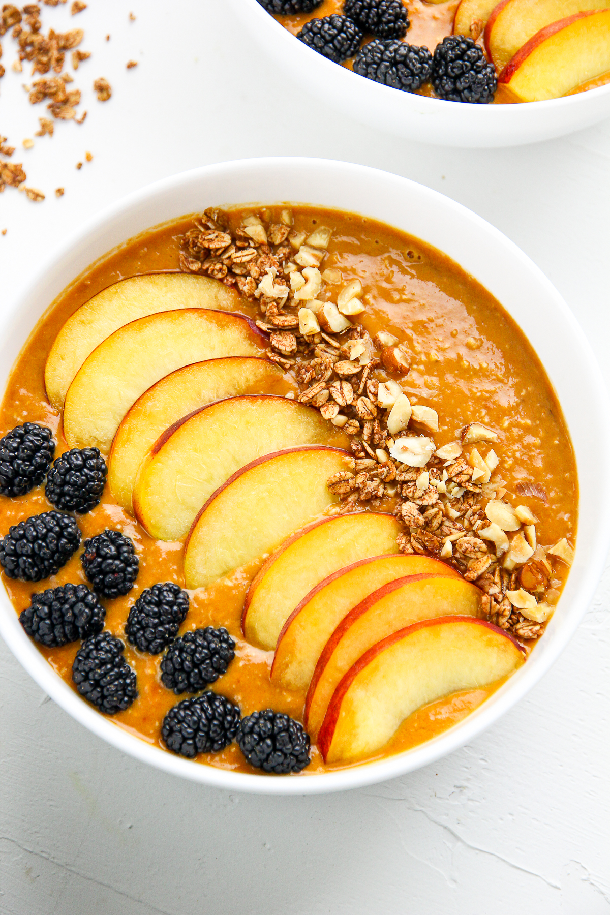 Morning me has exactly two speeds: half-asleep zombie and full-on smoothie-bowl cheerleader.
These Apricot Oatmeal Fruit Smoothie Bowls Recipe flip the switch to cheerleader in just the right way!