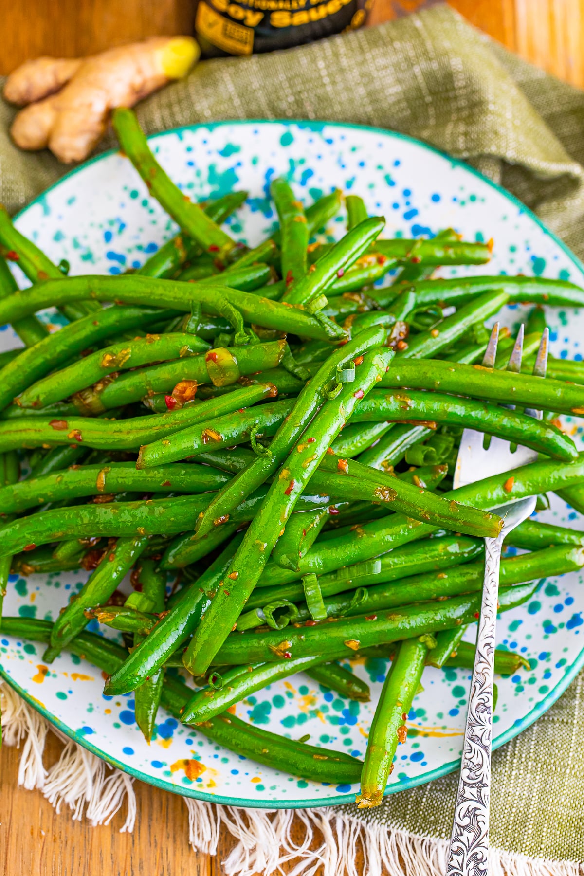 When I was a kid, every time Mom pulled out the large skillet I knew good things were coming.
We’re talking about a green bean stir fry recipe, here.