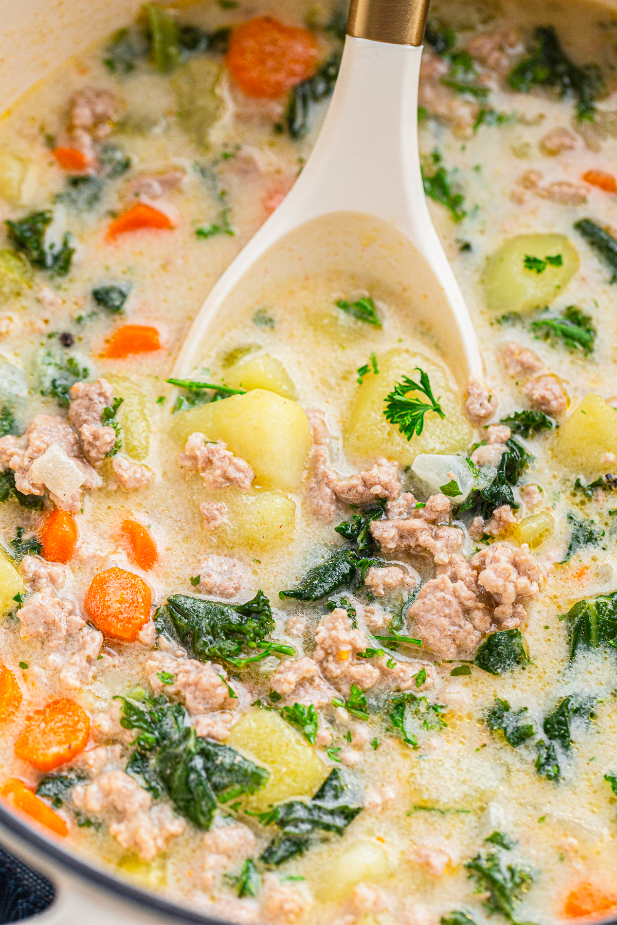 When I married Jeremy, I found that this man can (and will) rate every bowl of soup on a secret five-star system.
Enter the Kale Potato and Sausage Soup.