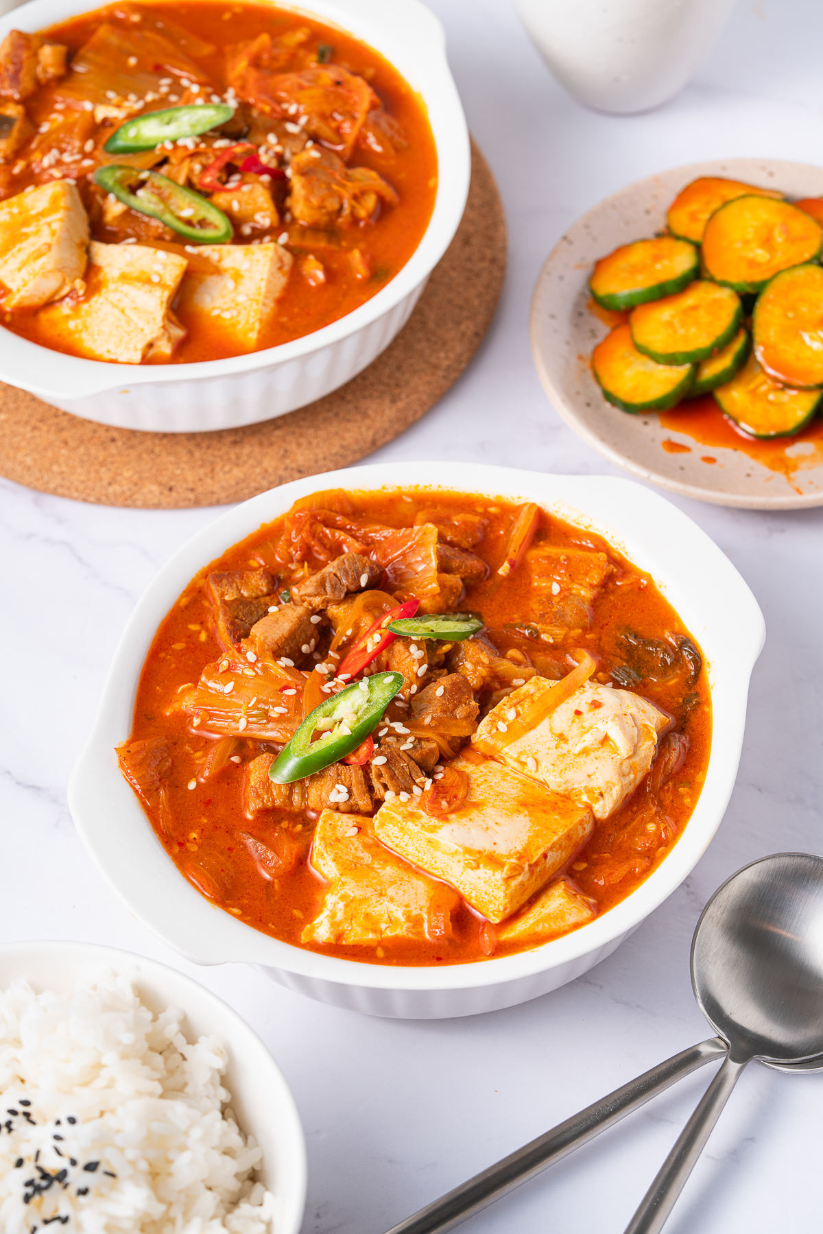 I’m not Korean (my accent is straight-up southern drawl) but I’ve fallen head-over-heels for Korean cuisine.
One spoonful of bubbling Kimchi Stew at a local Korean market and I was sold faster than you can say “bless your heart.”