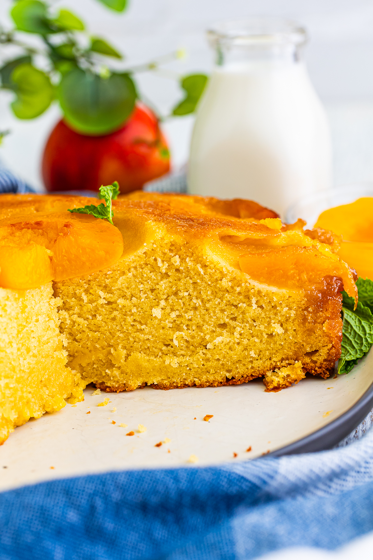 There’s nothing better on the warm days of peach season than a slice of Upside Down Cake with Peaches. 

Sweet peaches baked under buttery brown‑sugar syrup and flipped to shine on top of the cake!