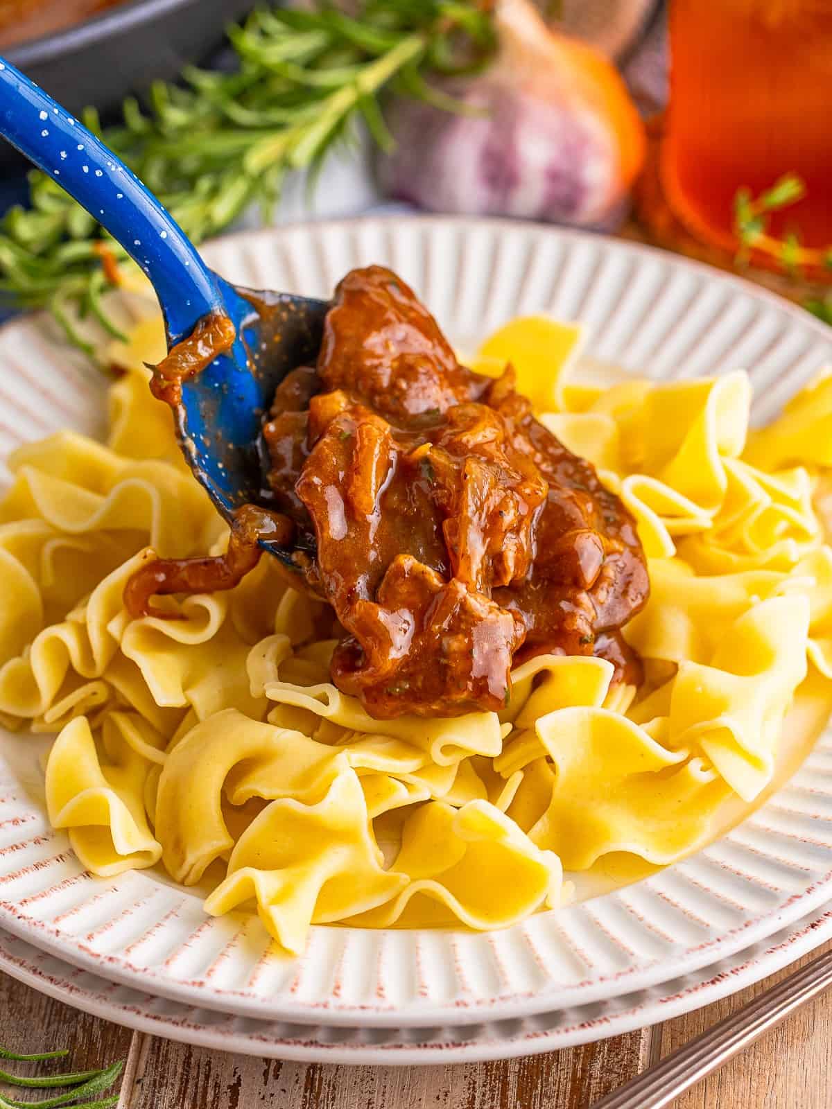Beef tips and gravy served over egg noodles.