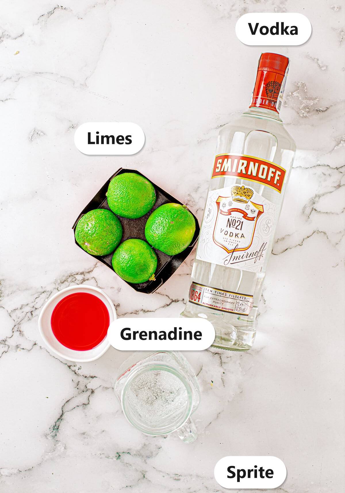 Labeled ingredients for Cherry Limeade Cocktail including vodka, limes, grenadine, and Sprite.