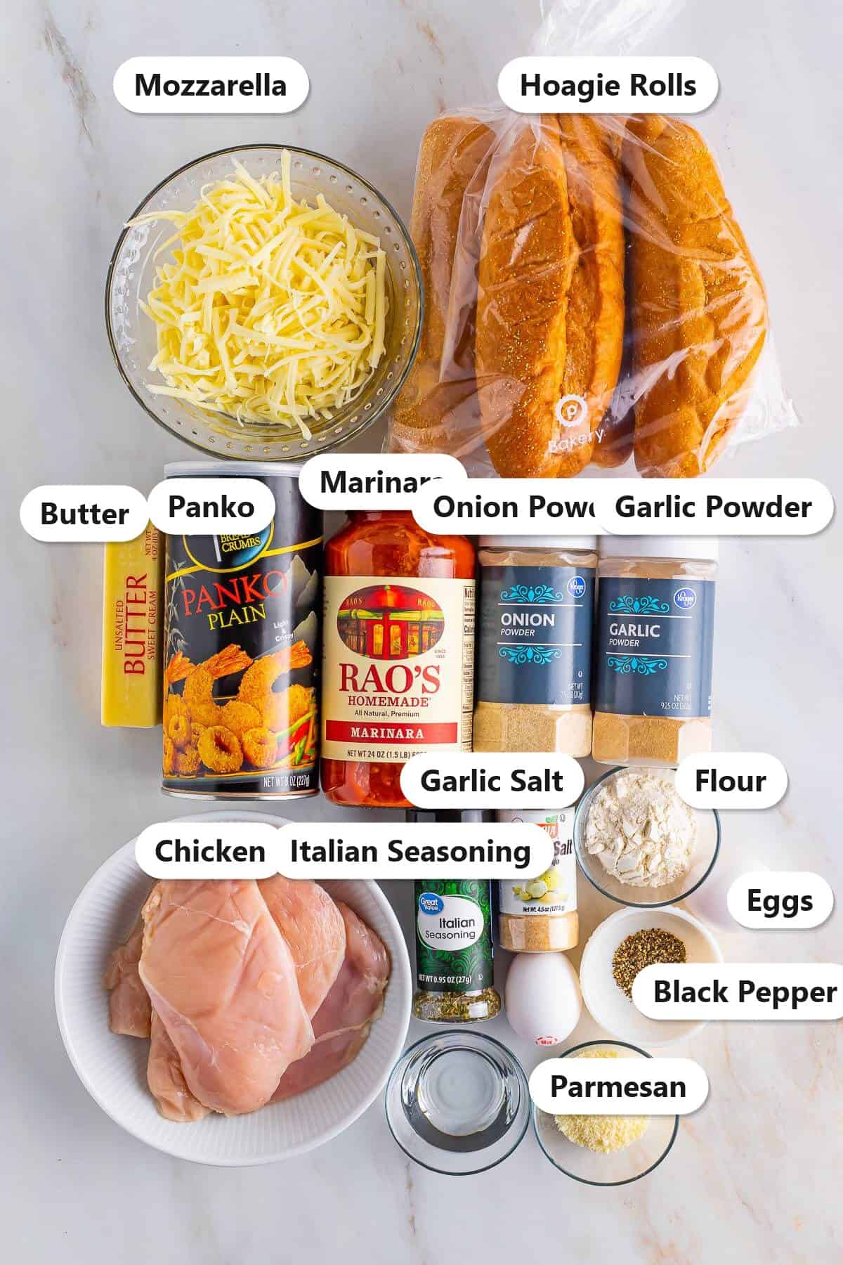 Labeled ingredients for a chicken parmesan sandwich including chicken cutlets panko mozzarella marinara hoagie rolls parmesan and seasonings.
