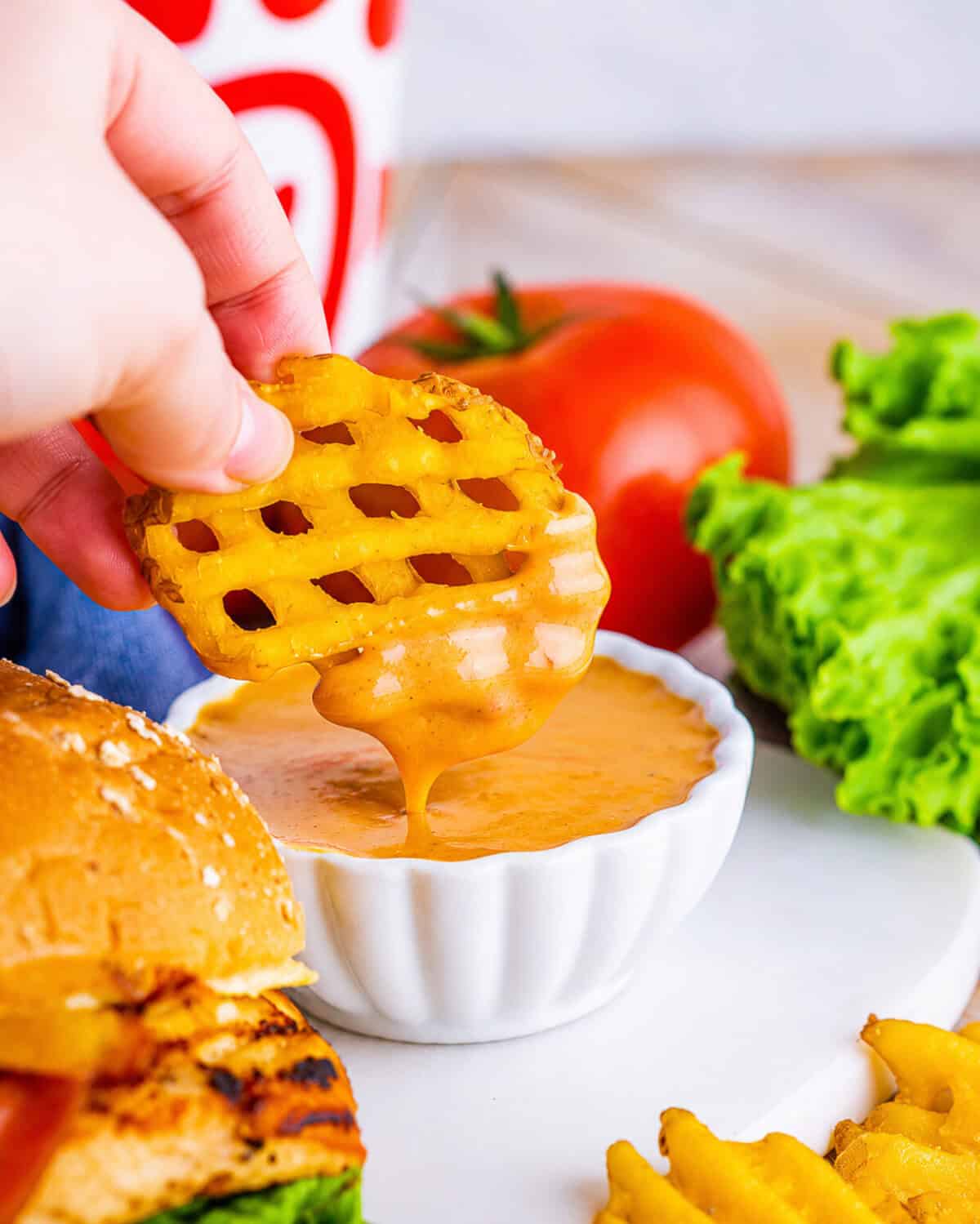 Copycat Chick-Fil-A Honey Roasted BBQ Sauce Recipe in a small dipping bowl with a glossy smoked-paprika-tinted finish, ready to serve as a creamy sweet-savory dipping sauce.