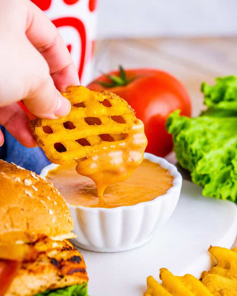 Copycat Chick-Fil-A Honey Roasted BBQ Sauce Recipe in a small dipping bowl with a glossy smoked-paprika-tinted finish, ready to serve as a creamy sweet-savory dipping sauce.