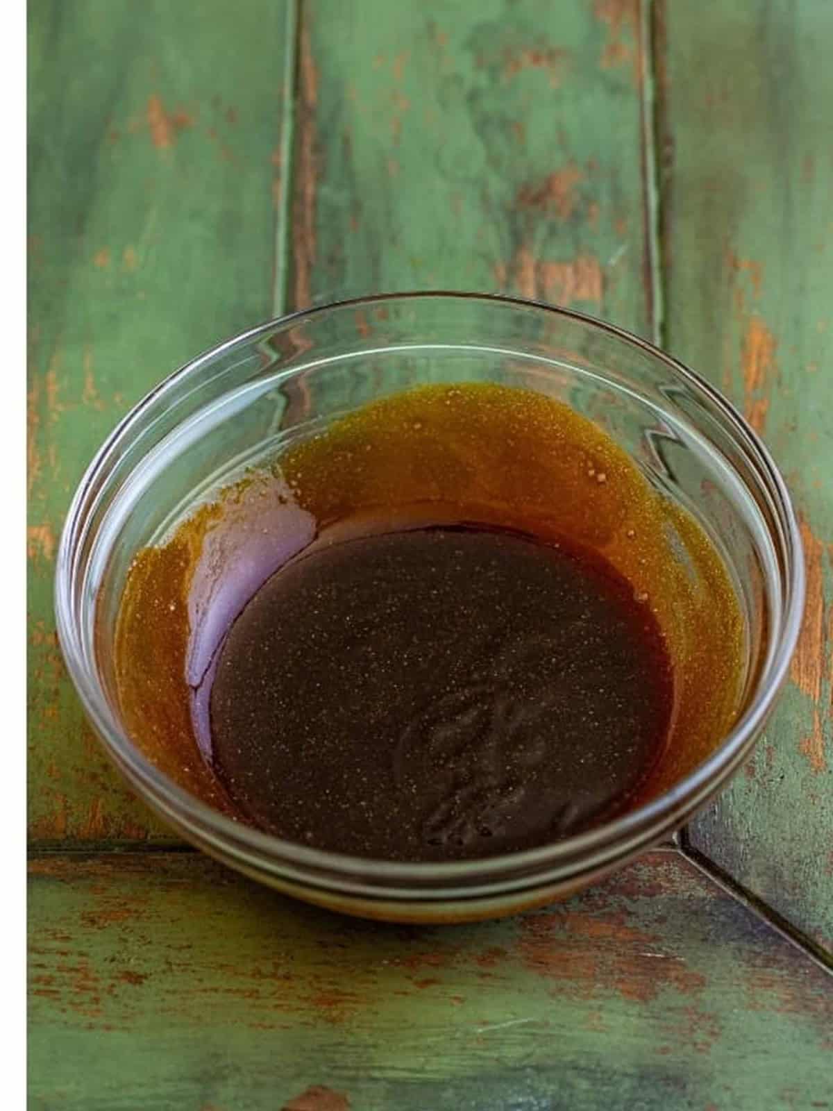 Asian hoisin soy glaze whisked together in a glass bowl for the Chilean Sea Bass Recipe.