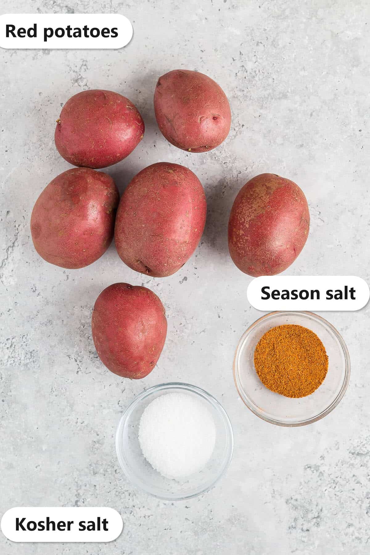 Labeled ingredients for Deep Fried Potato Wedges including red potatoes season salt and kosher salt.