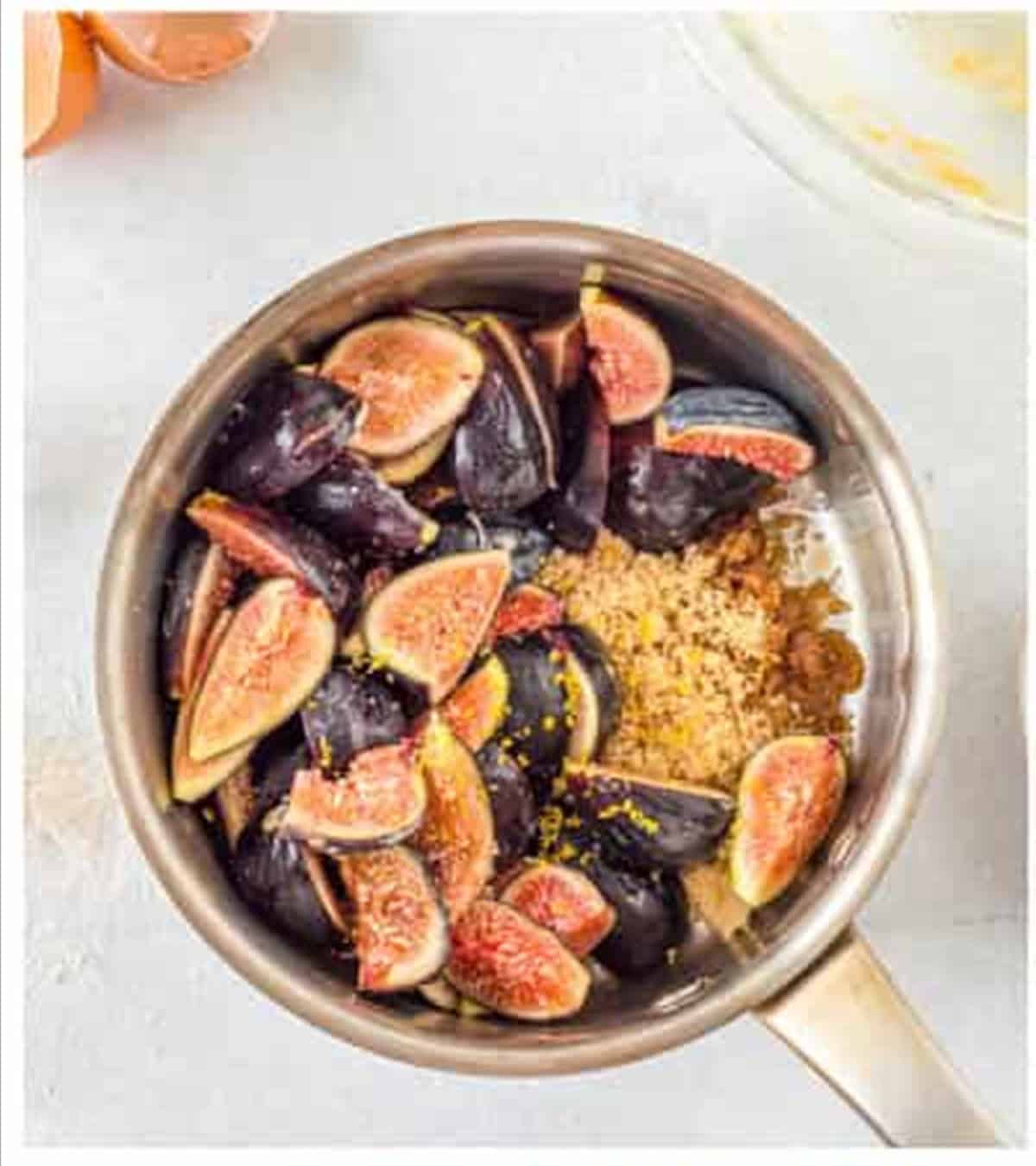 Fresh figs, brown sugar, and lemon in a saucepan for the filling.