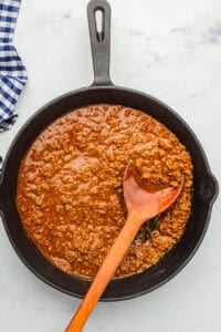 Finished Coney Sauce Recipe pulsed to a perfectly smooth, spreadable consistency in the pan, ready to spoon onto hot dogs.