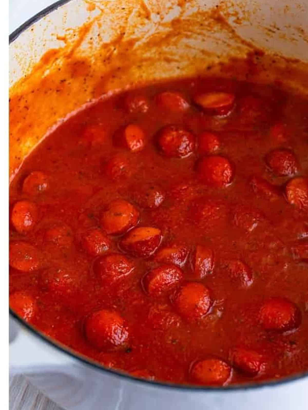The finished hot dog spaghetti sauce ready to serve over noodles.