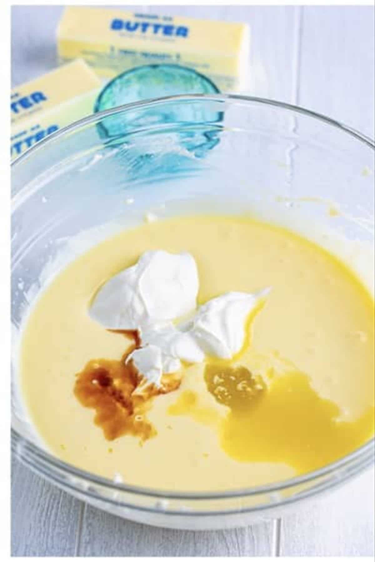 Cheesecake springform pan placed inside a large roasting dish ready for a water bath bake.