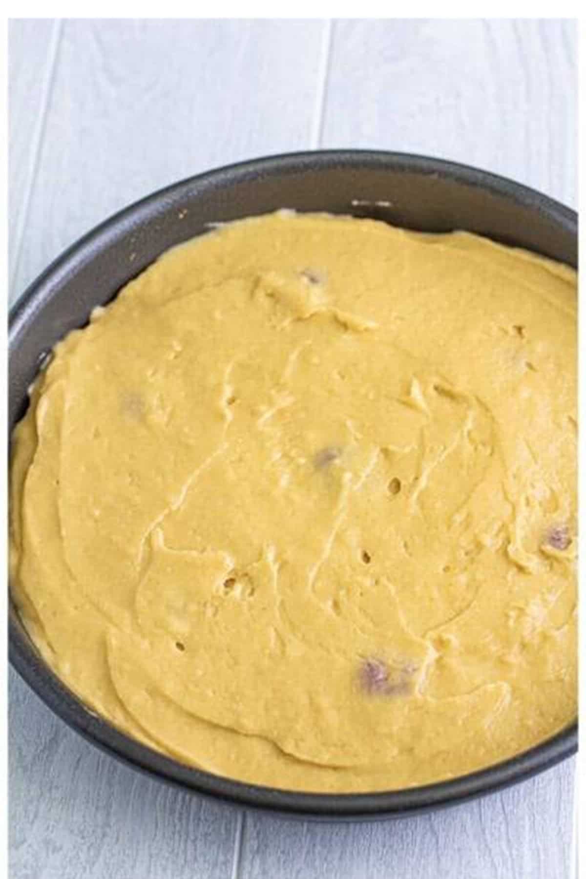 Golden brown baked Pineapple Upside Down Cake layers in the cake pans fresh from the oven.