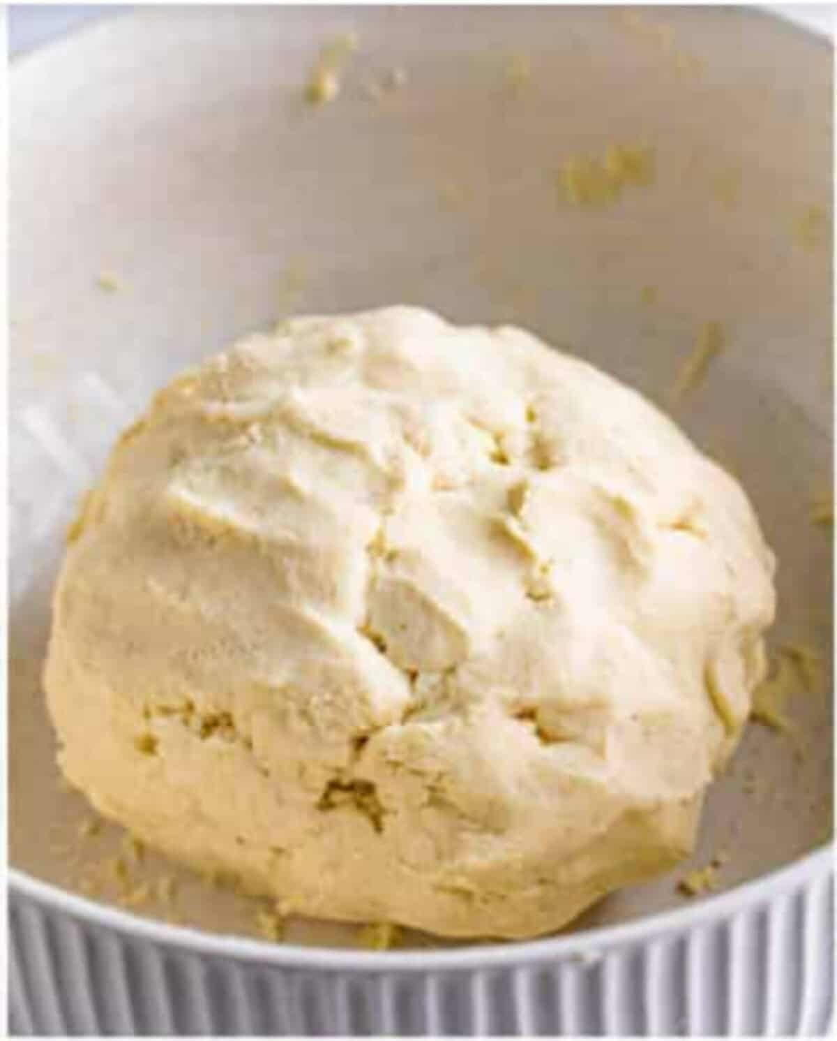 Smooth, moist pupusa dough ball kneaded by hand for a Pupusas Recipe.