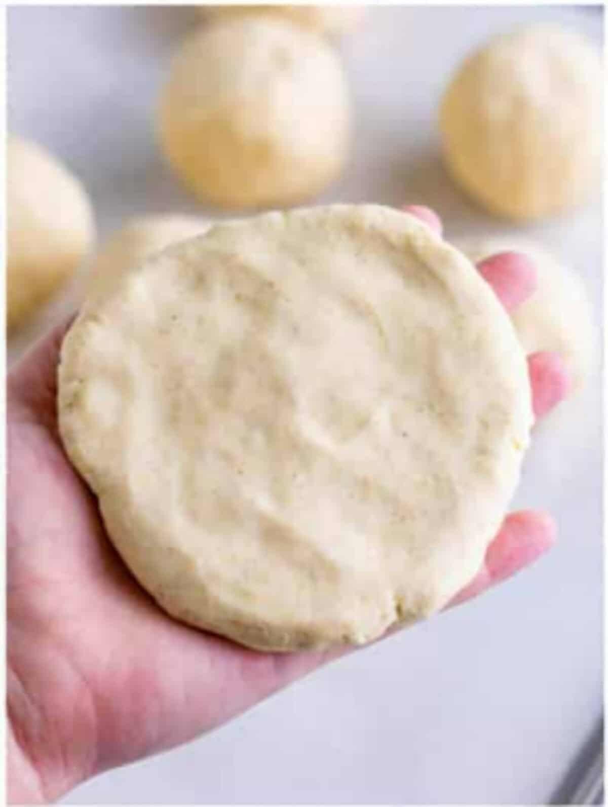 Pupusas cooking on a hot griddle until golden brown and slightly charred for a Pupusas Recipe.