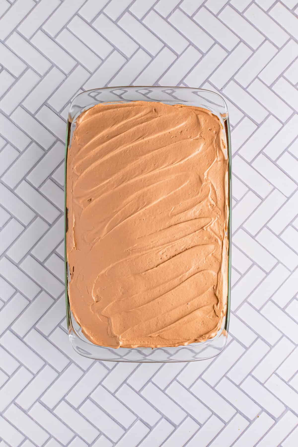 Finished picture of the cake with the frosting on it.