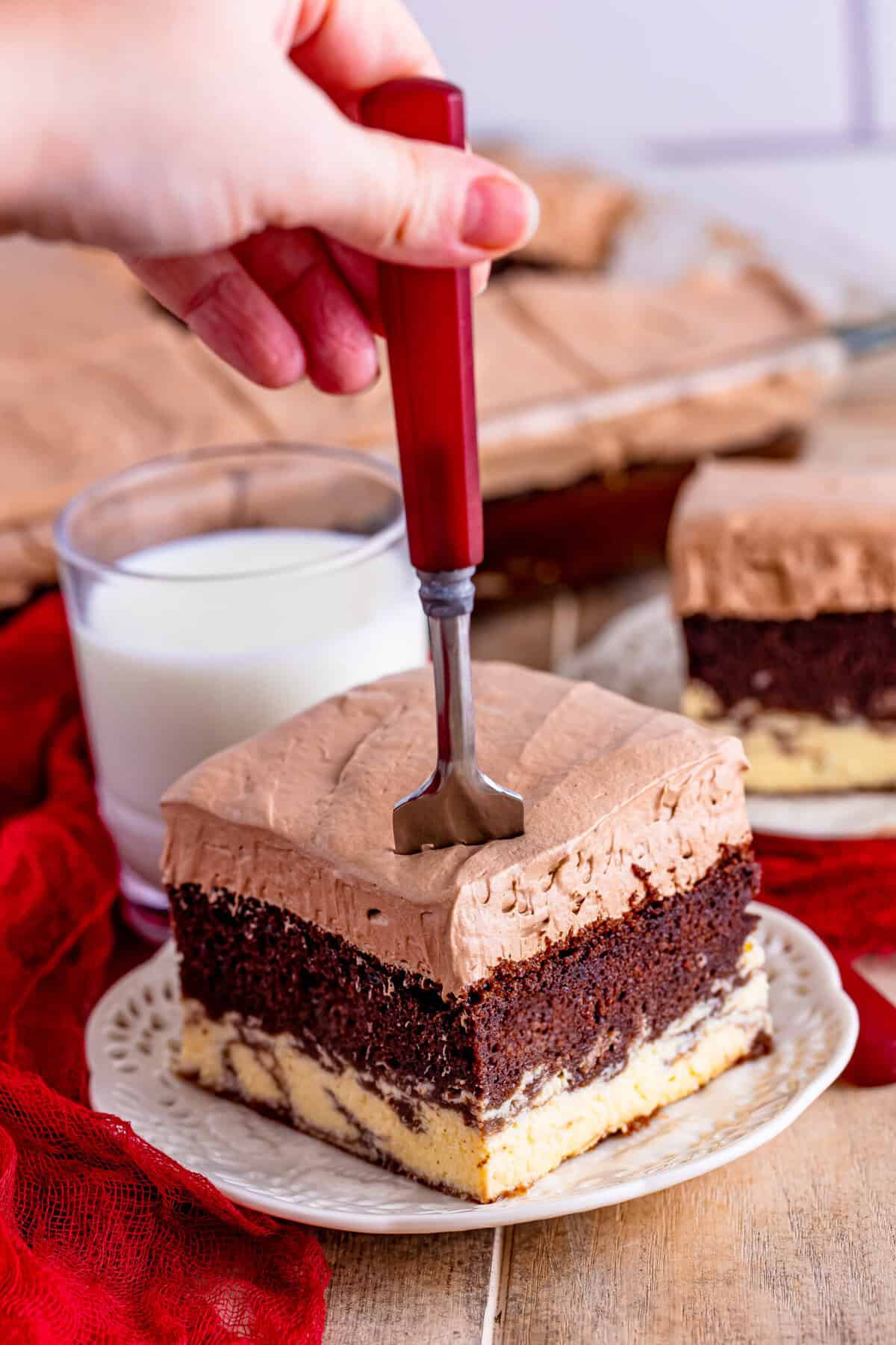 Picture of a piece of the Italian Love cake with a fork in it.