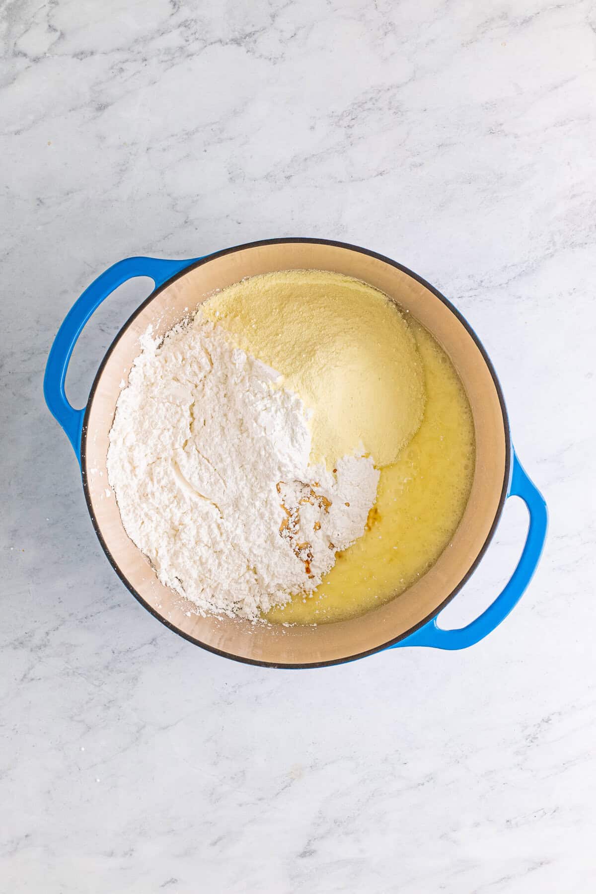 The caramel pecan log nougat filling cooked into a thick paste and pressed into a baking dish.