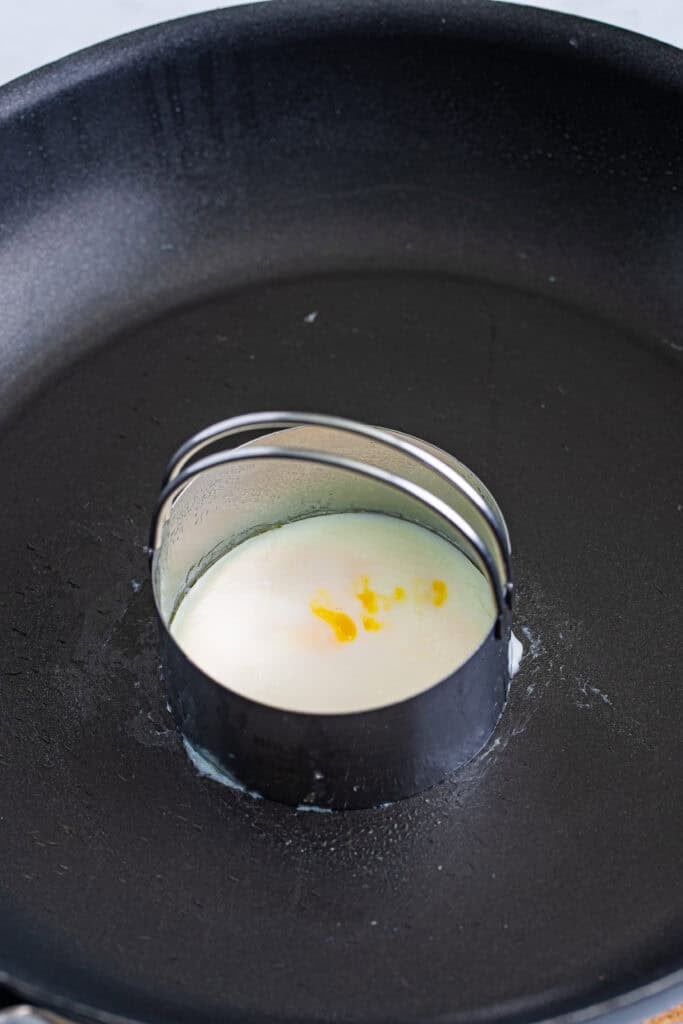 Egg fired in an egg mold so it looks exactly like the Mc Donalds original.