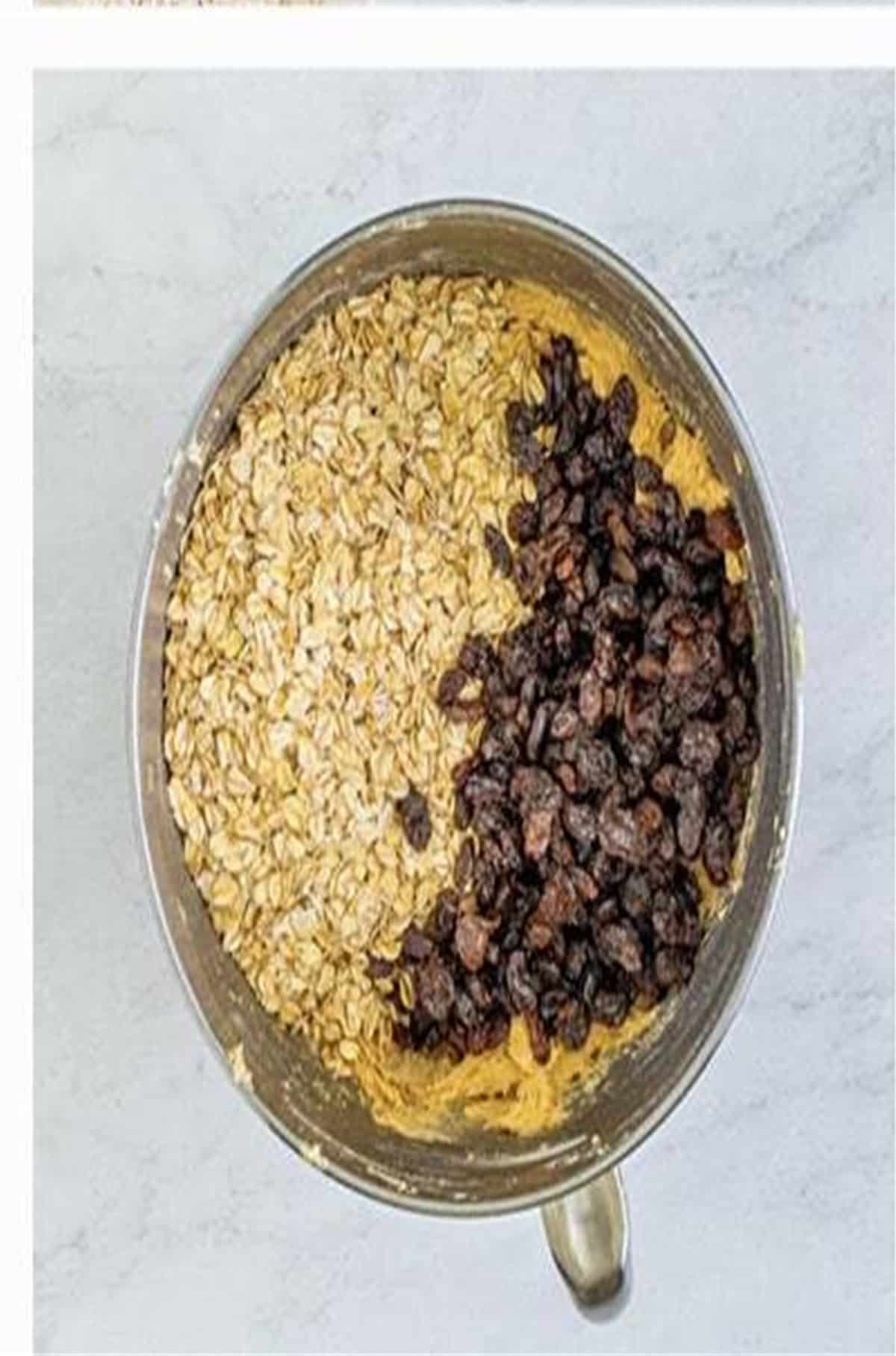Old-fashioned oats and plump raisins added on top of the cookie dough for Soft Chewy Oatmeal Raisin Cookies.