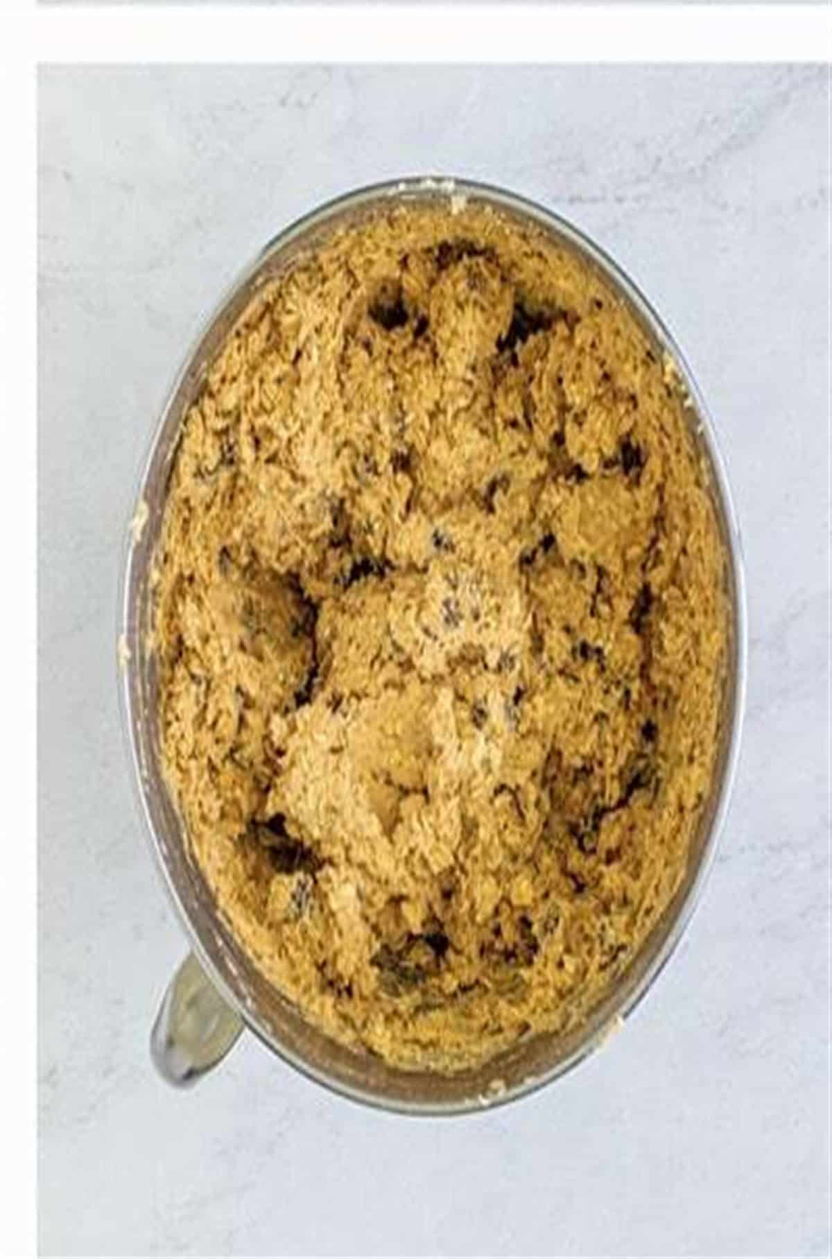 Final cookie dough with oats and raisins evenly distributed for Soft Chewy Oatmeal Raisin Cookies (Old Fashioned).