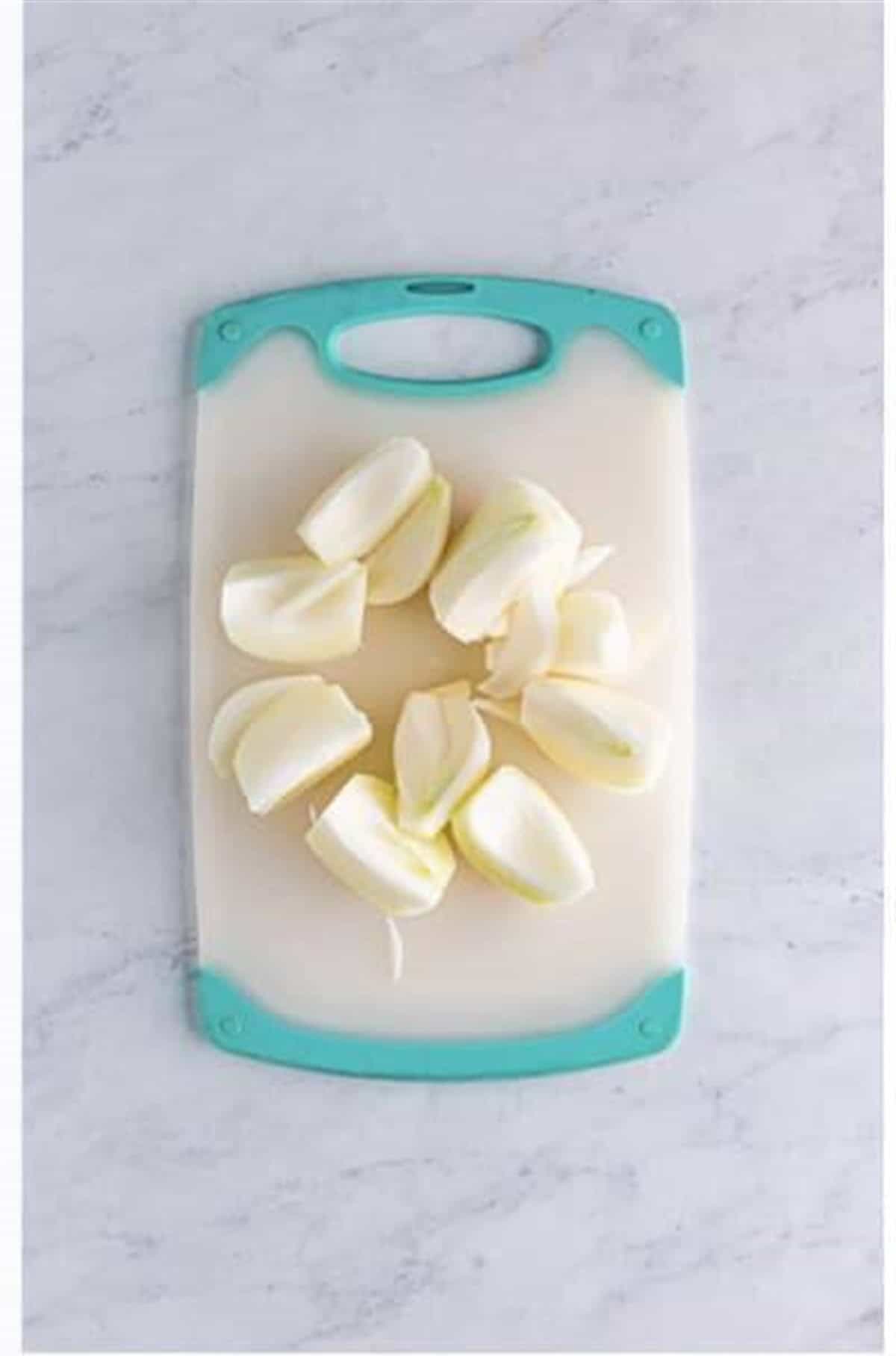 Gently separate the onion petals apart for Crispy Onion Petals Recipe.