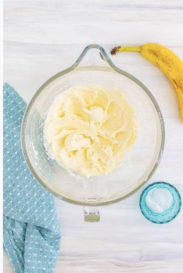 Whipping cream cheese, sugar, egg, and vanilla together for the cheesecake filling.