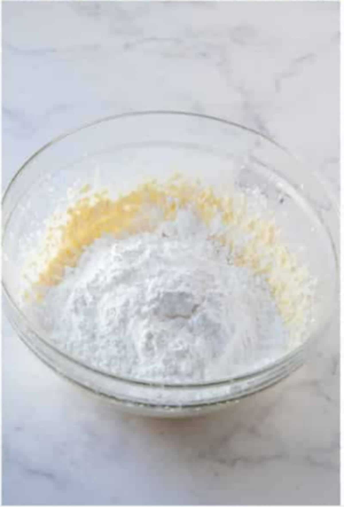 Cream cheese mixture beaten smooth in a bowl.